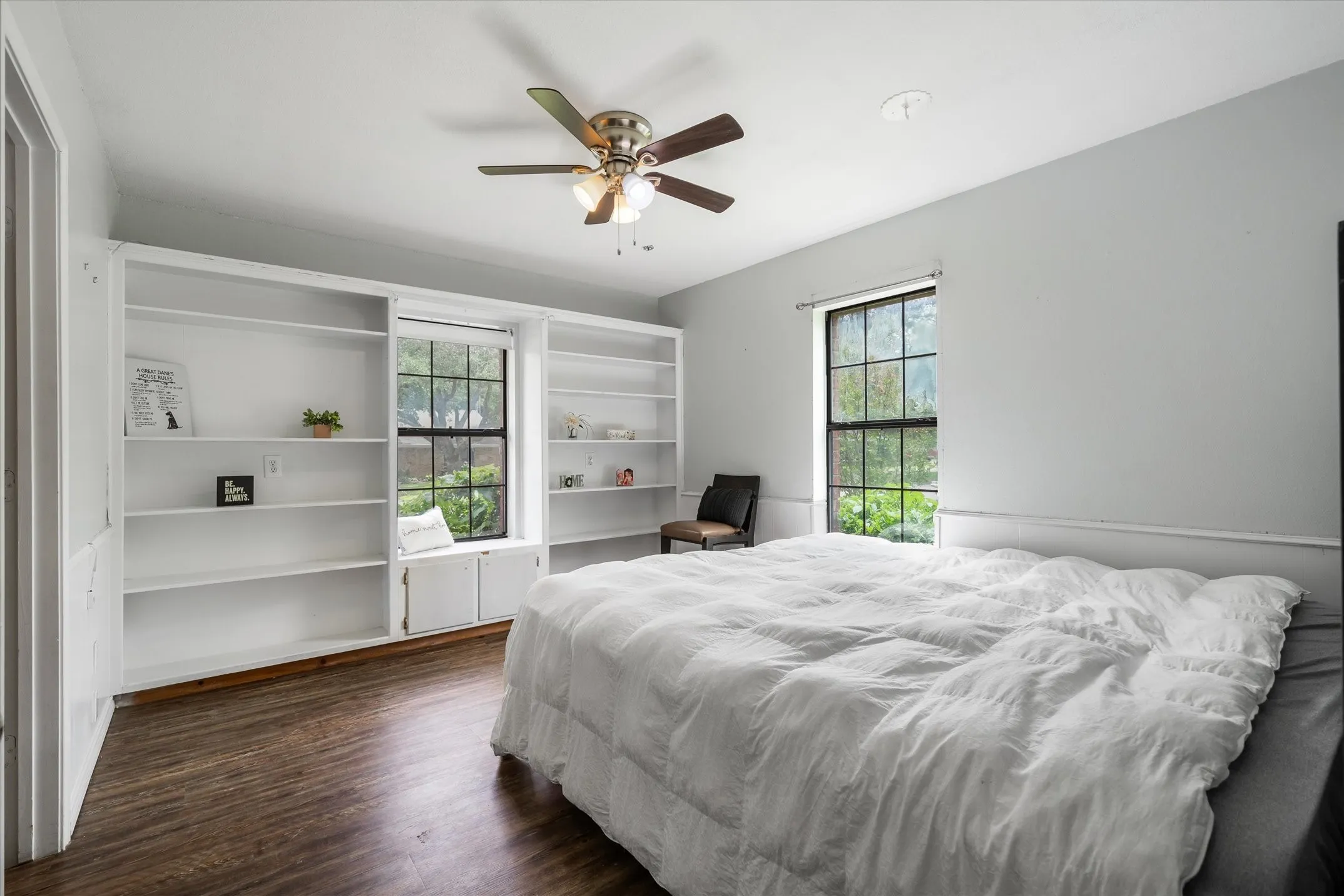 Light and airy, built-in shelving, window seat and walk-in closet. This room has its own ensuite bath. Perfect for multi-generational home.