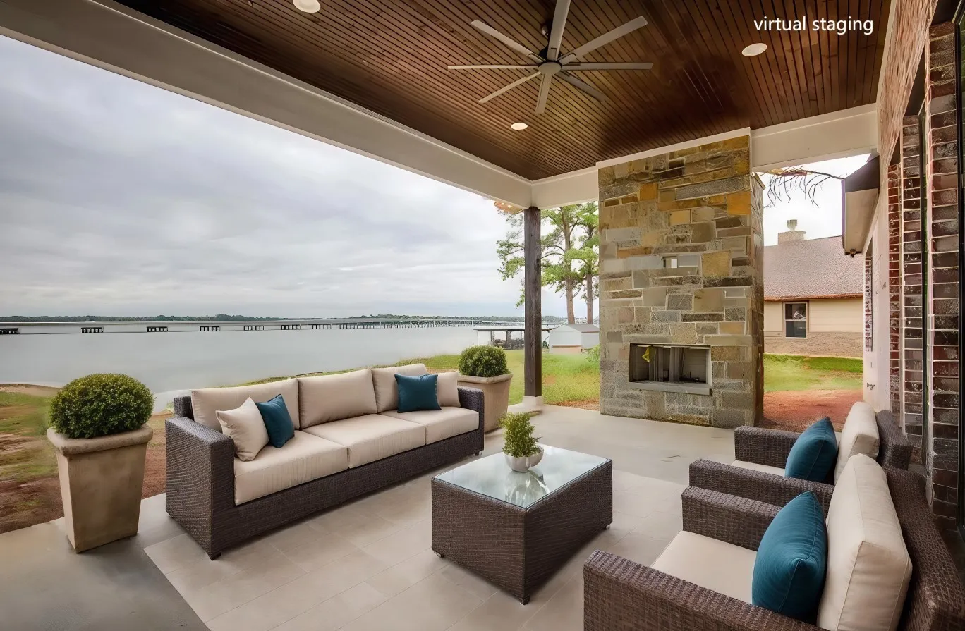 View of patio with a water view, ceiling fan, and an outdoor living space with a fireplace