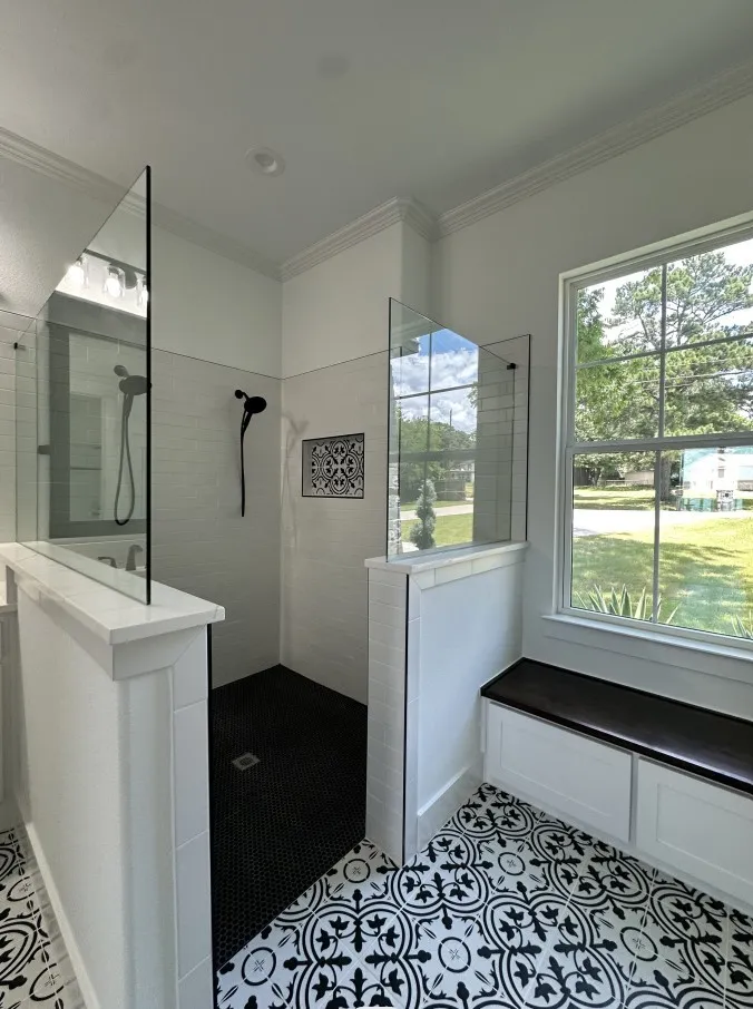 Full bathroom with walk in shower, ornamental molding, and tile patterned floors