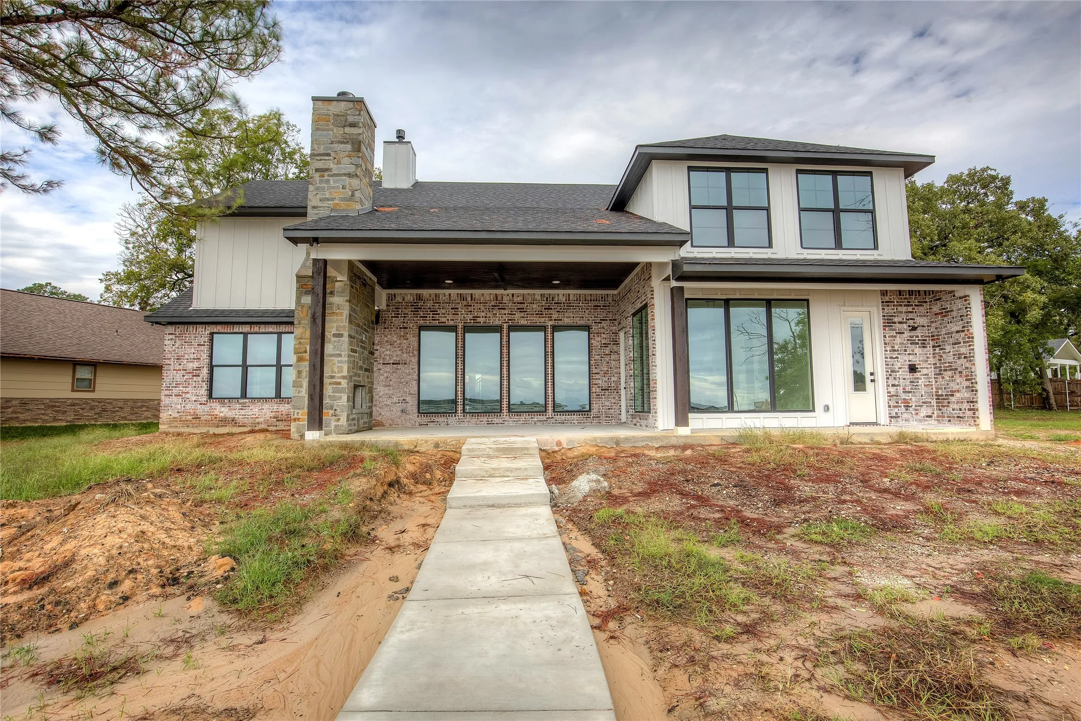Single Family Residence For Sale in Henderson County , 105 Donna Drive, Gun Barrel City, Texas 75156, 4 Bedroom, 4 Bathroom, 2 Garage spaces, 3,272 Sqft, built in 2023, Price $1,339,000, mls#21264613, Real Estate Agent in Gun Barrel City, Homes For Sale in Henderson county, Homes For Sale in Gun Barrel City, Realtor in Gun Barrel City Texas, Real Estate Brokerage Independent Realty Texas, Luminita Cordes Realtor