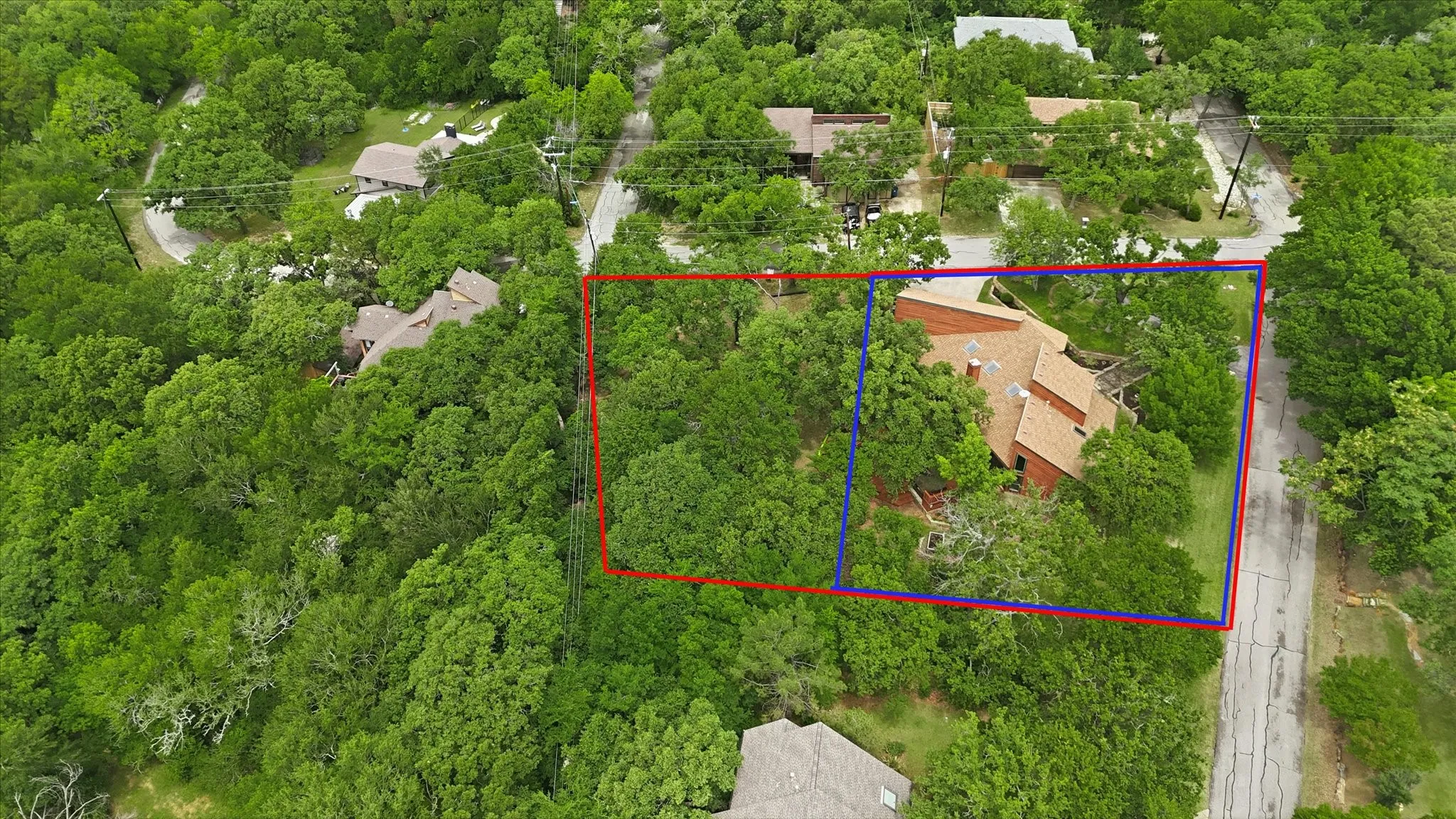 view of both lots with red and blue line estimated division