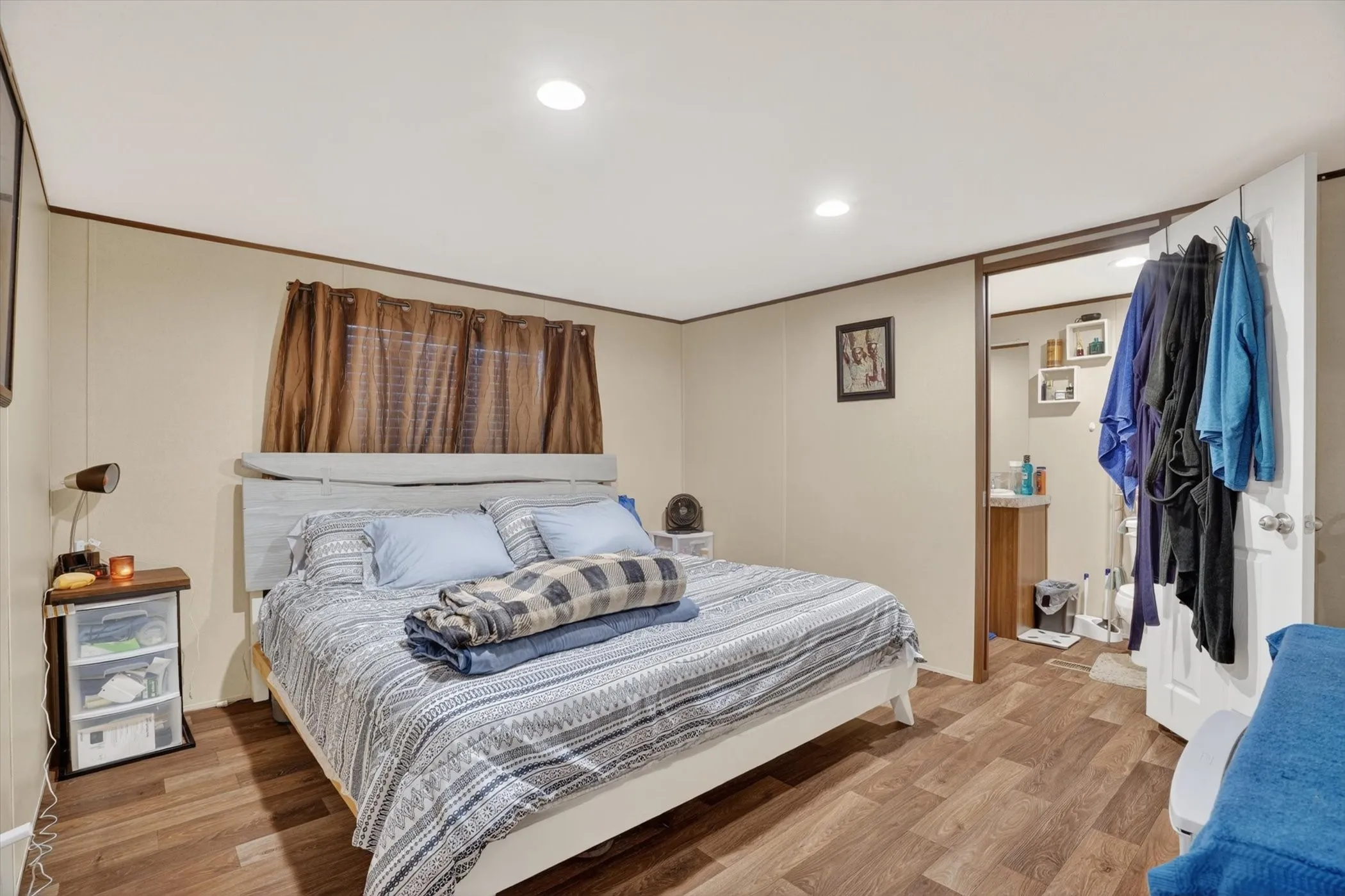 primary bedroom with private bathroom