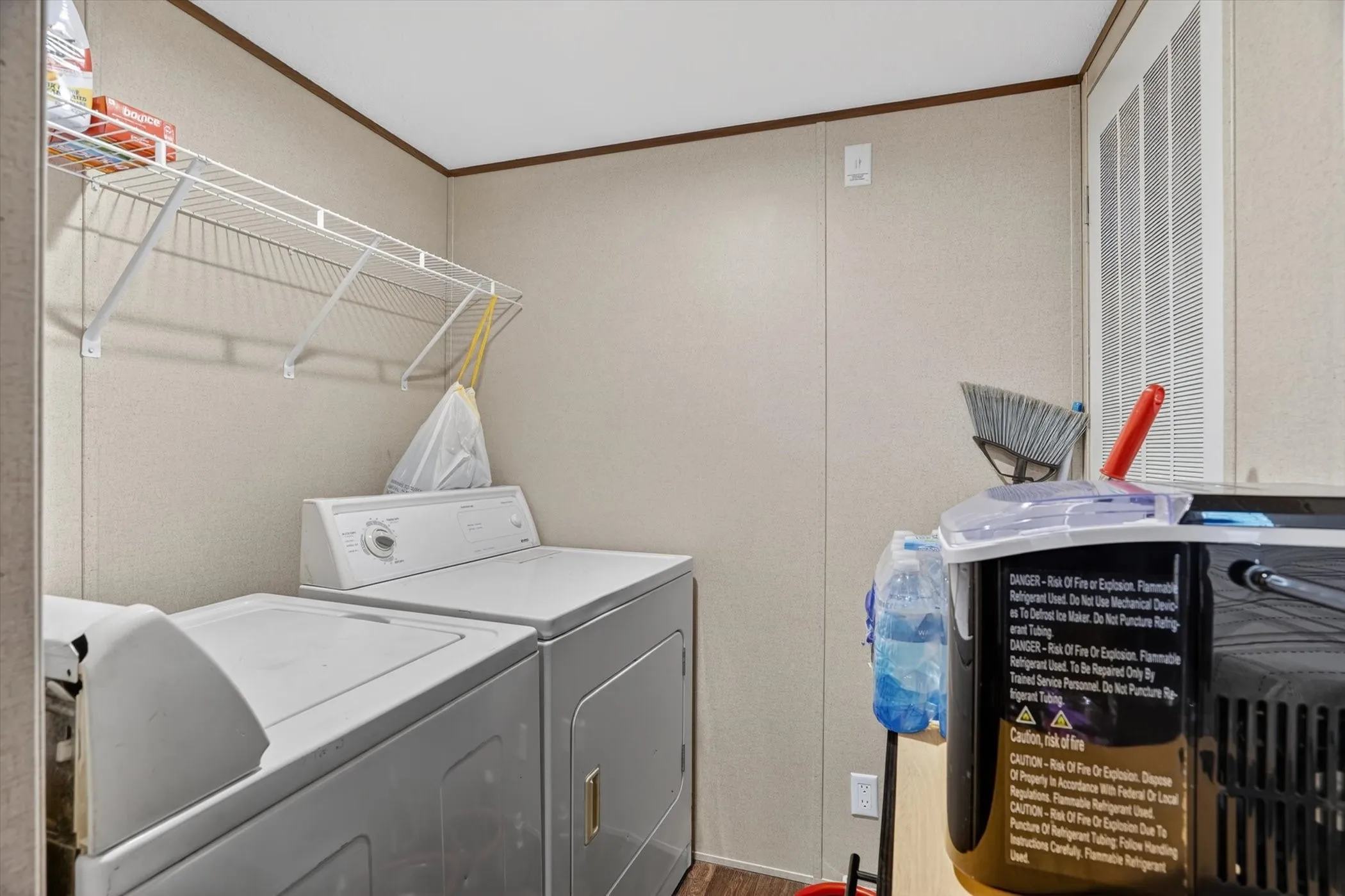 above laundry storage shelf
