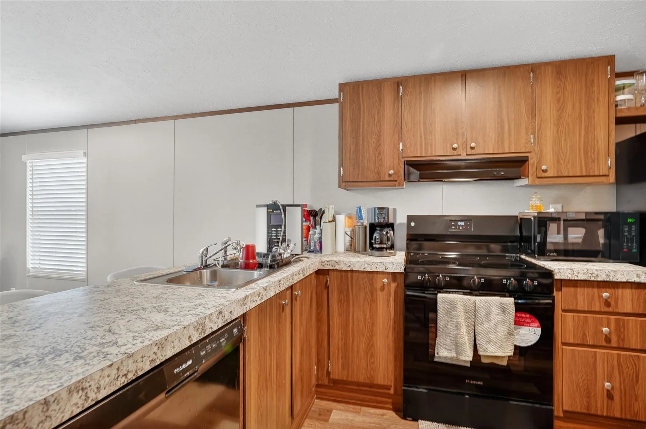 dishwasher and sink in bar