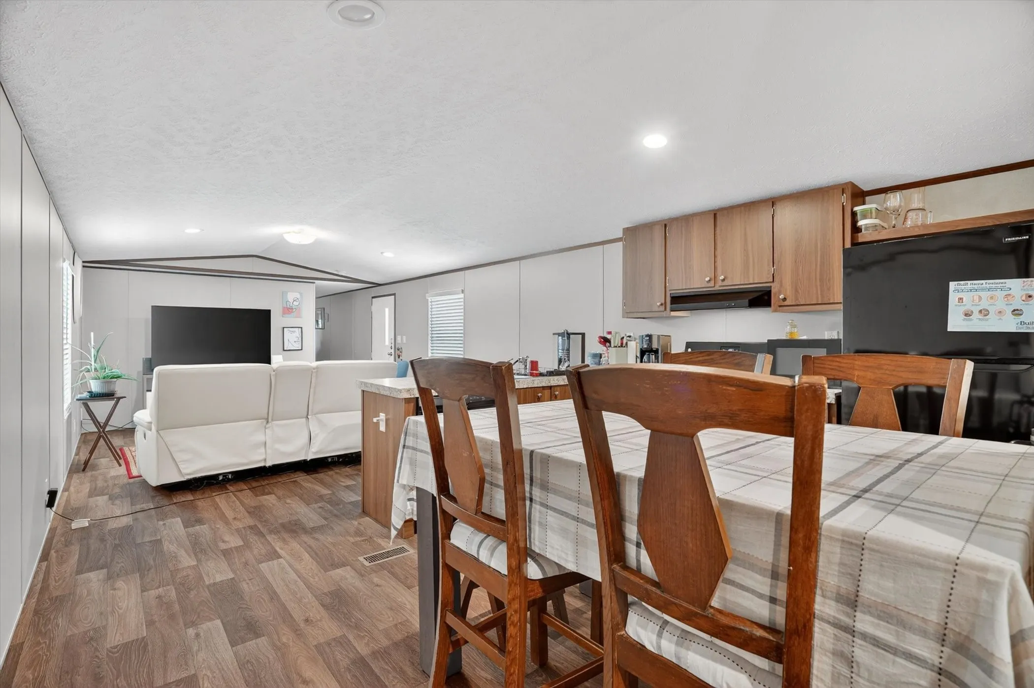 open concept living, kitchen and dining