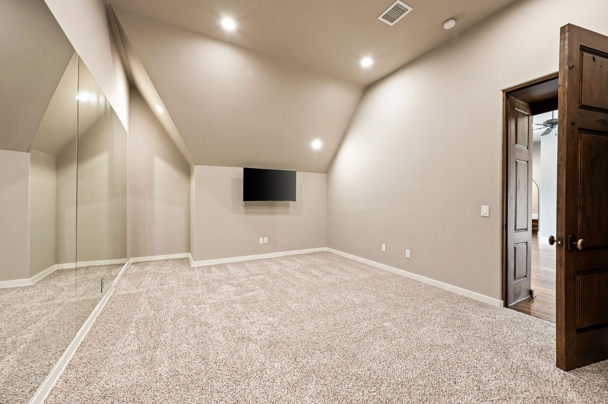 Flex space off gameroom.  Could be a gym, craft area or storage closet.