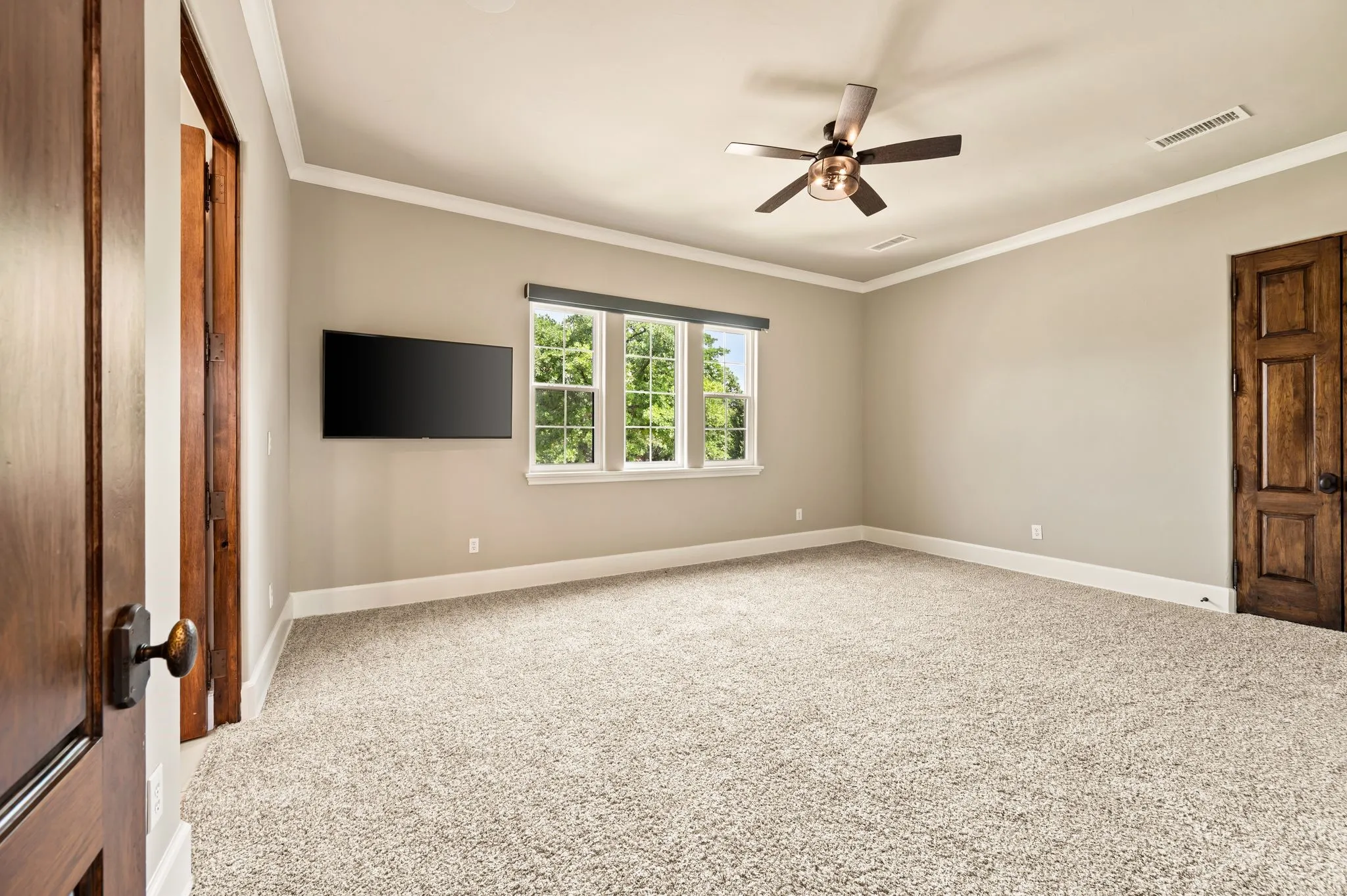 Secondary up bedroom with ensuite baths, and walk in closets.  3 total bedrooms upstairs.