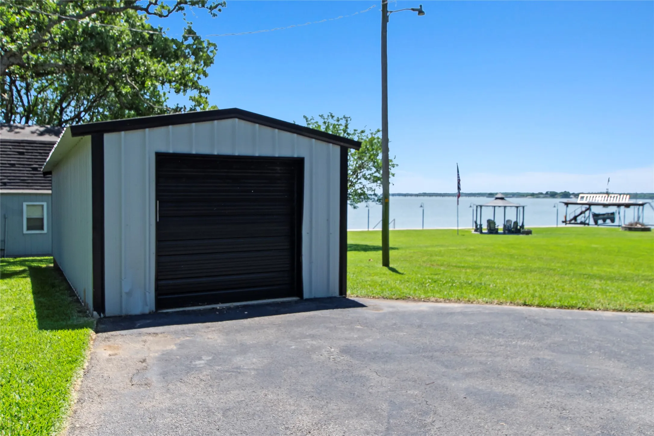 Metal Shop perfect for storage of lake toys or lawn equipment.