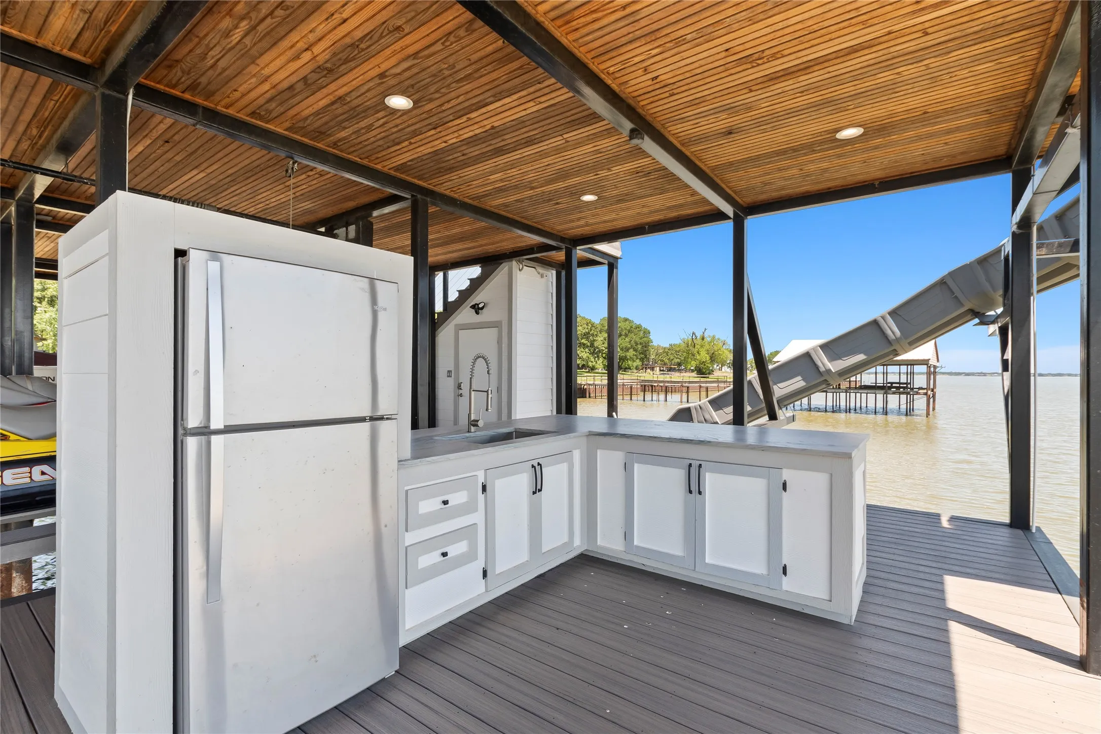 Wet Bar with Full Size Fridge and Bar Seating