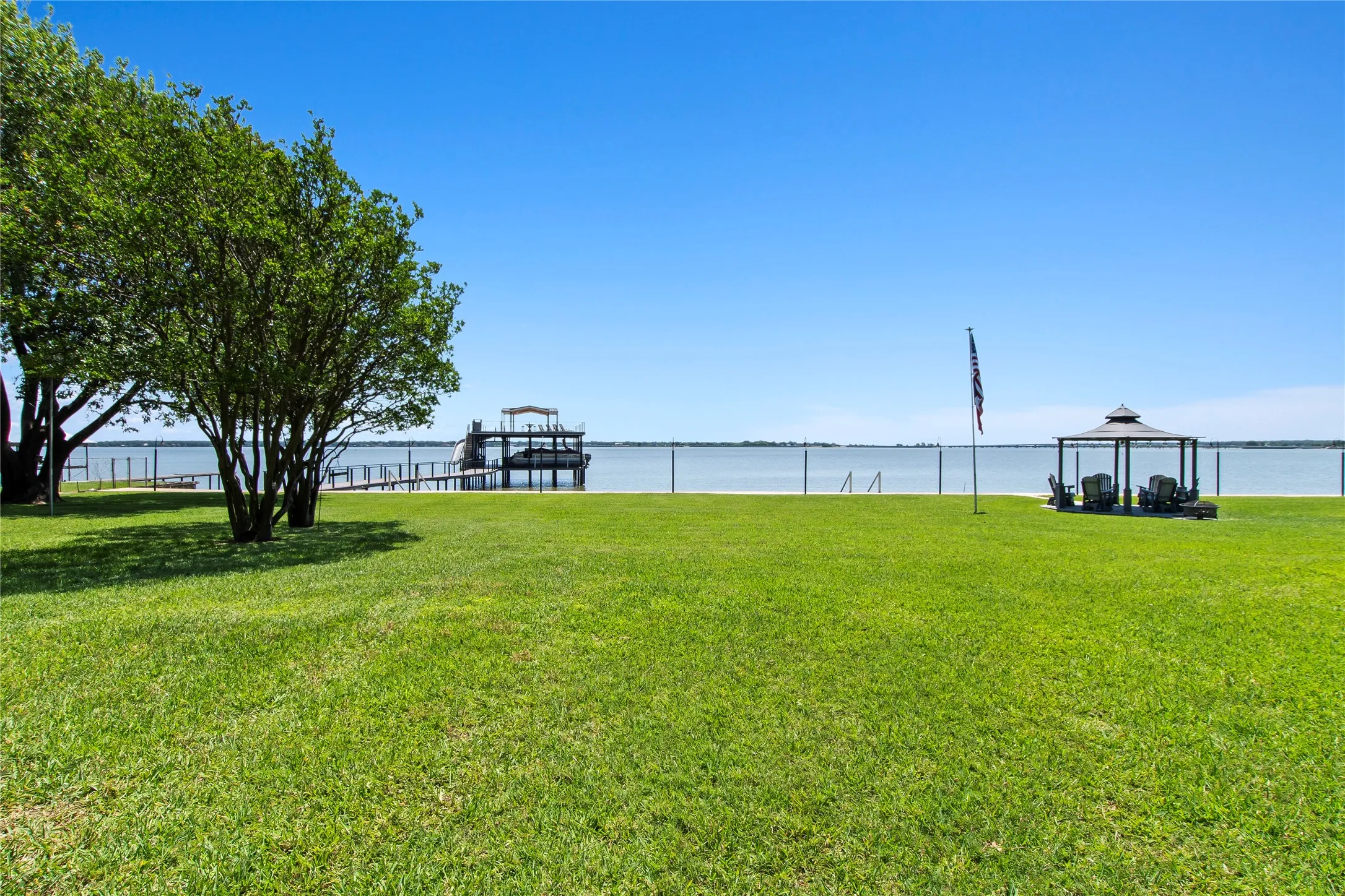 Expansive yard with plenty of room to add a pool or play cornhole. Also a covered gazebo and fire pit area.