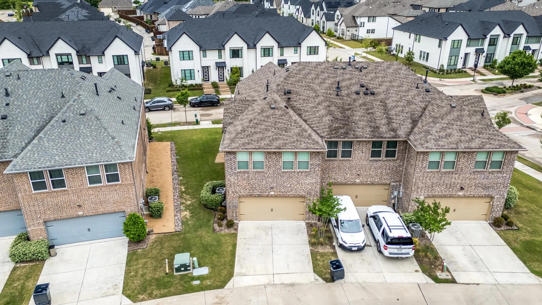 Extra long driveway and greenspace for this Townhome