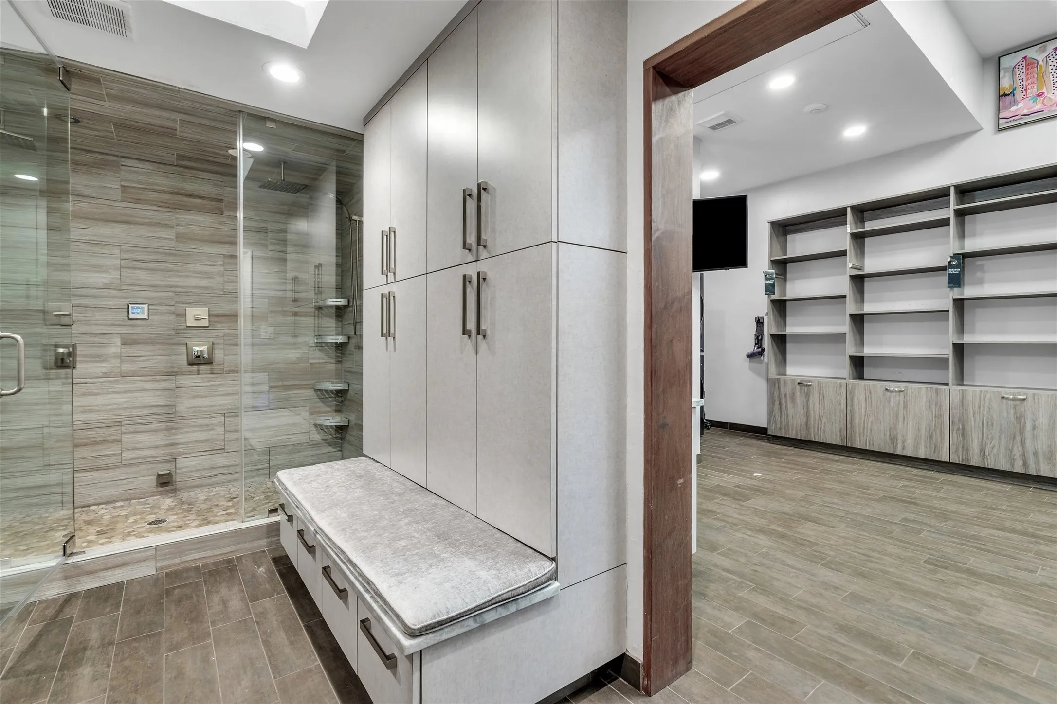 Updated Primary Bath with oversized shower and dual shower heads.