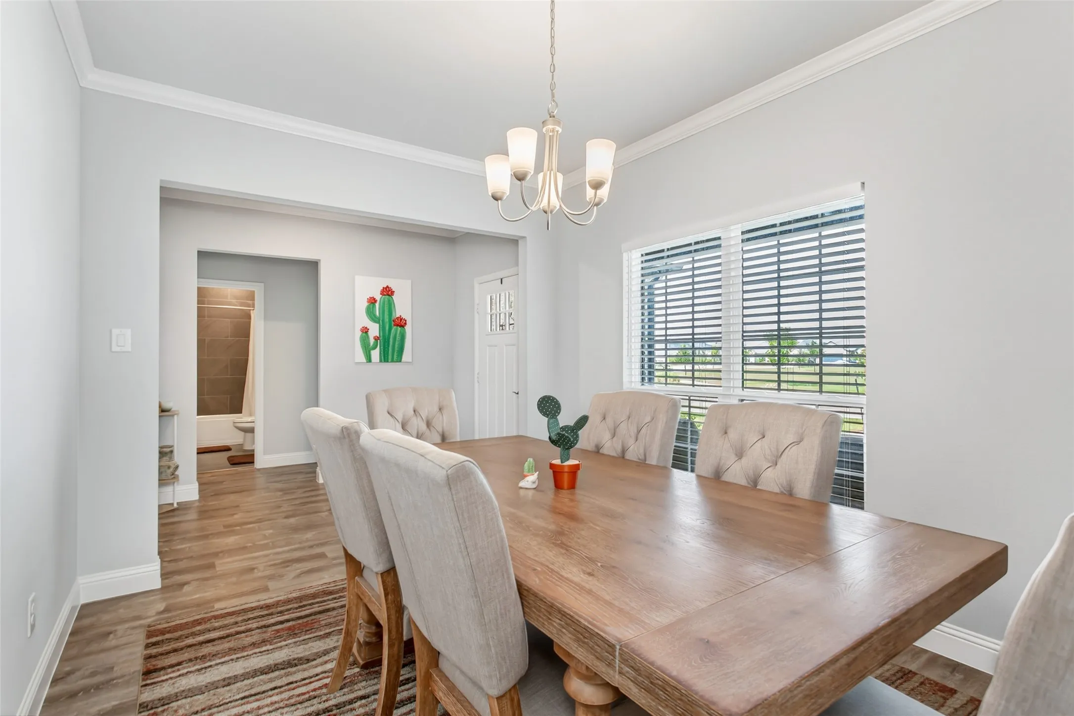 The spacious dining area is perfect for hosting family dinners, holidays, or gathering with friends.