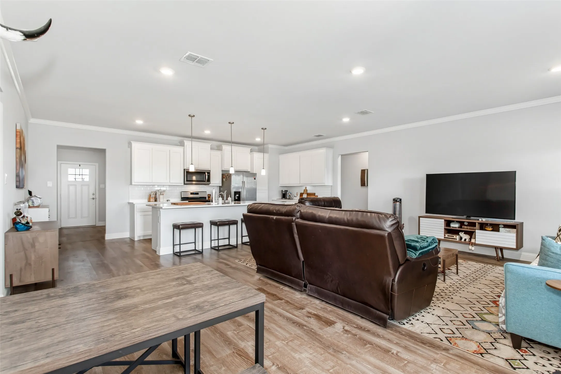 Enjoy open-concept living with a spacious layout that keeps everyone connected from the kitchen to the heart of the home.