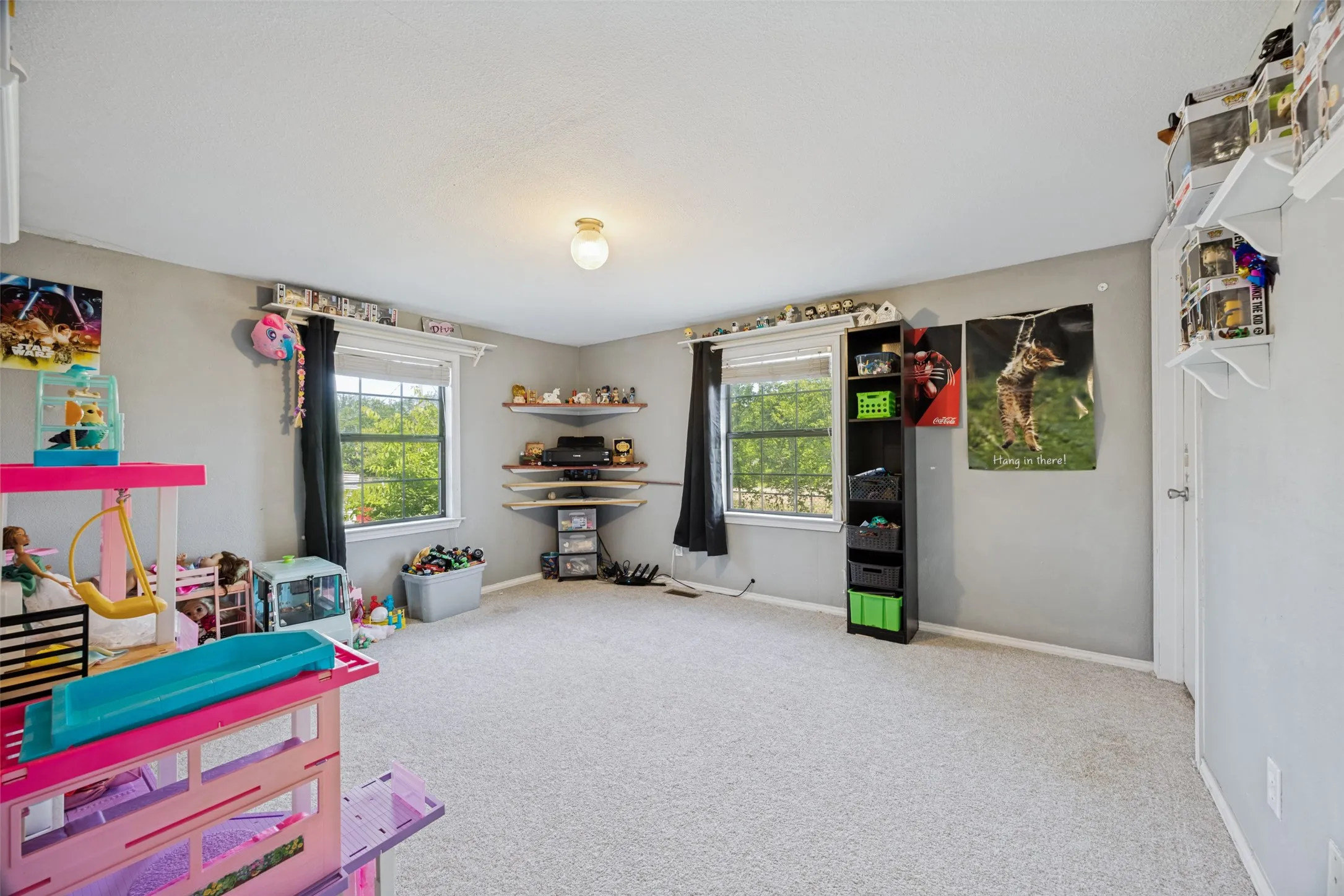 14x13 Flex Space:  Office, Gaming Room, Play Room, Second Living Room.  This could even be another bedroom with a bonus room located through that door to the right.