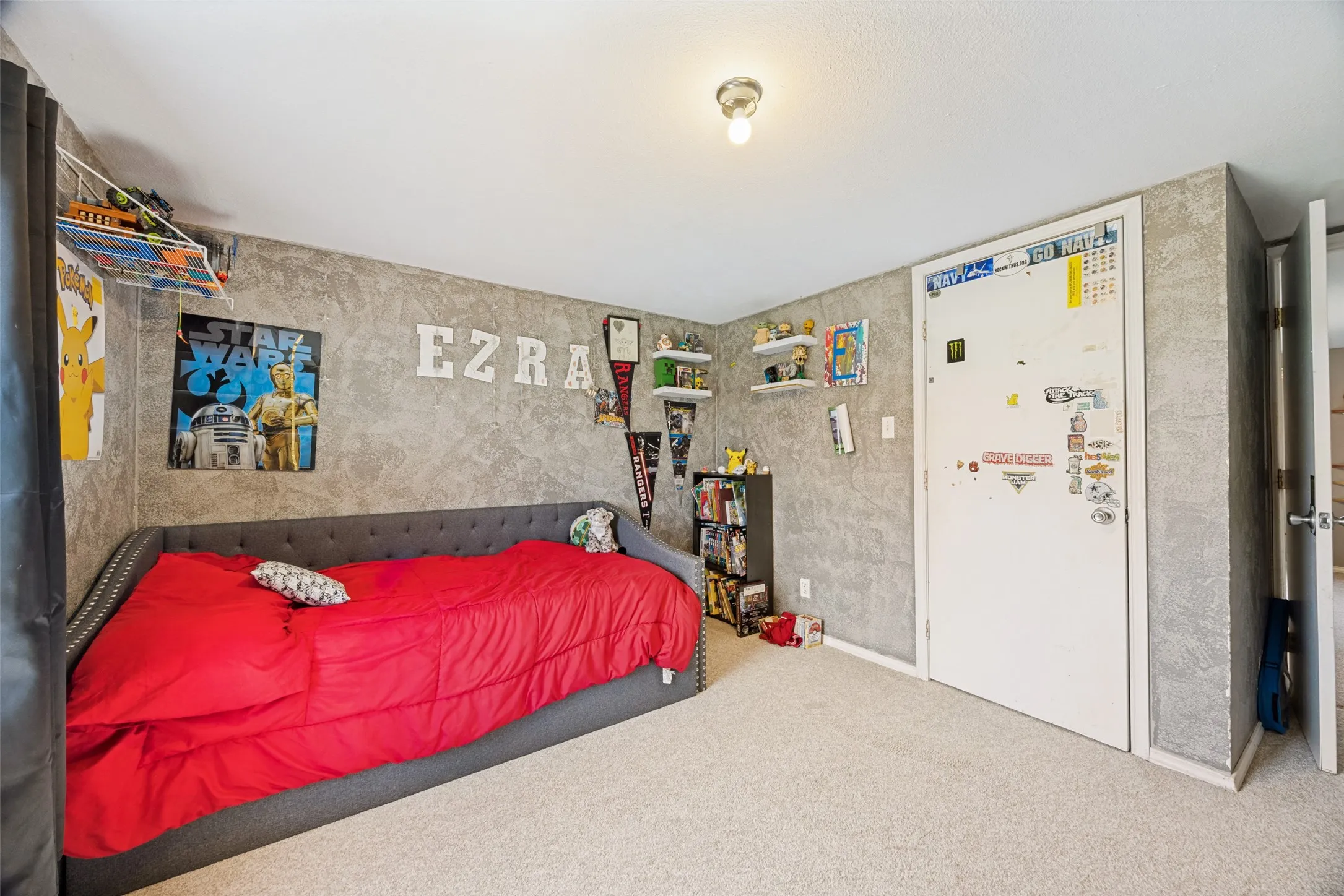 Bedroom #4 Measures 10x11 and features - Carpeted room with a textured wall finish.