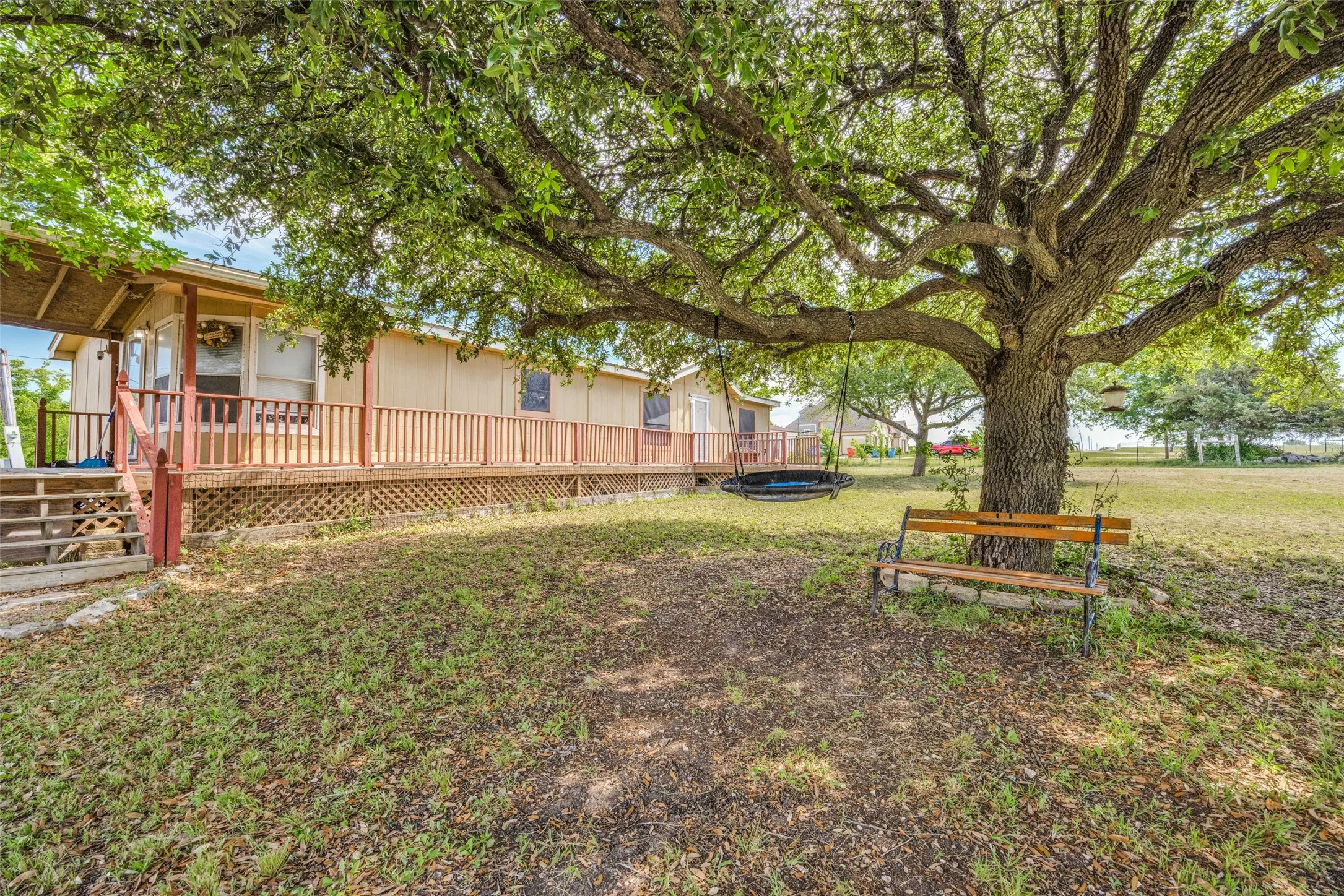 Welcome to 843 County Road 4900, Trenton, TX -  Come sit a spell under the beautiful front tree providing natural shade