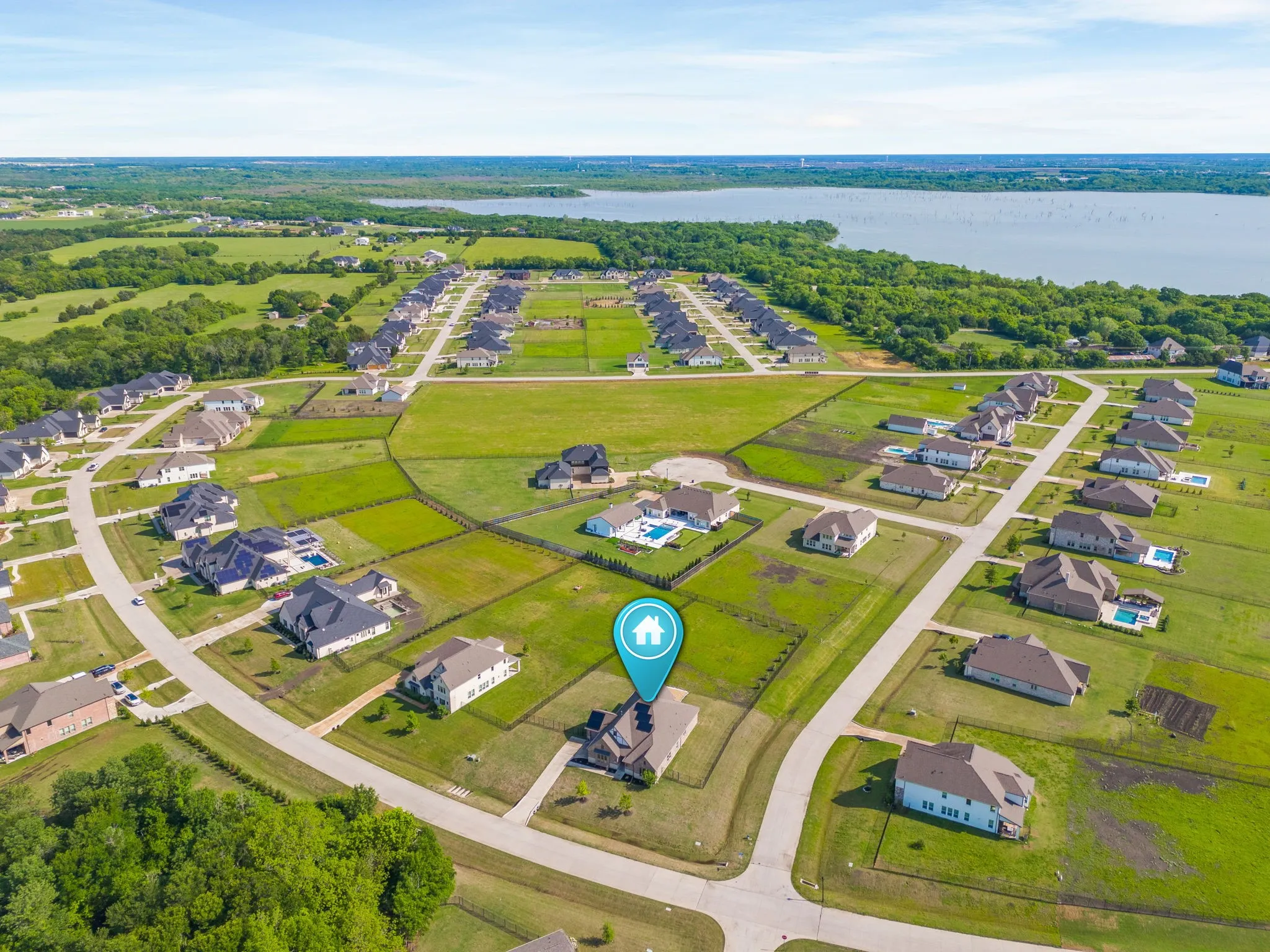 Aerial view featuring a residential view and a water view