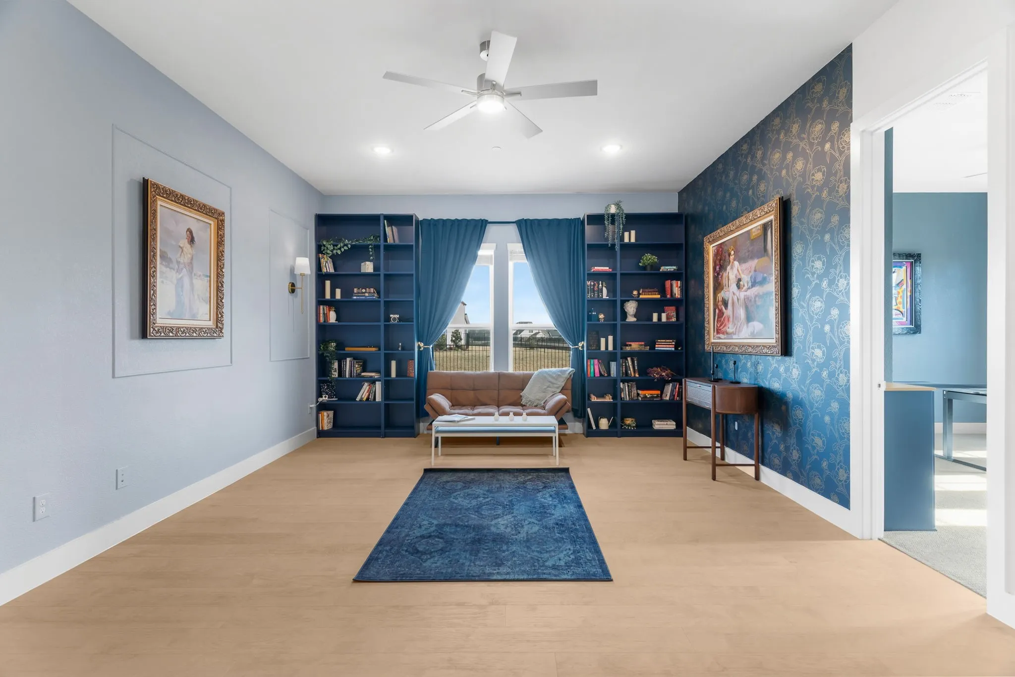 Living area with built in book shelves