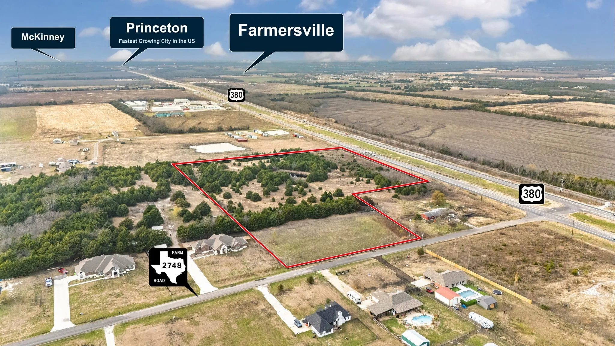 Expansive land parcel featuring direct frontage on a major highway