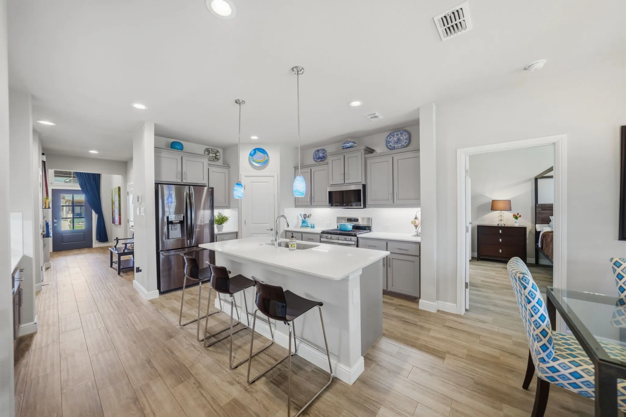 gas range, under counter lighting, and coffee wine bar