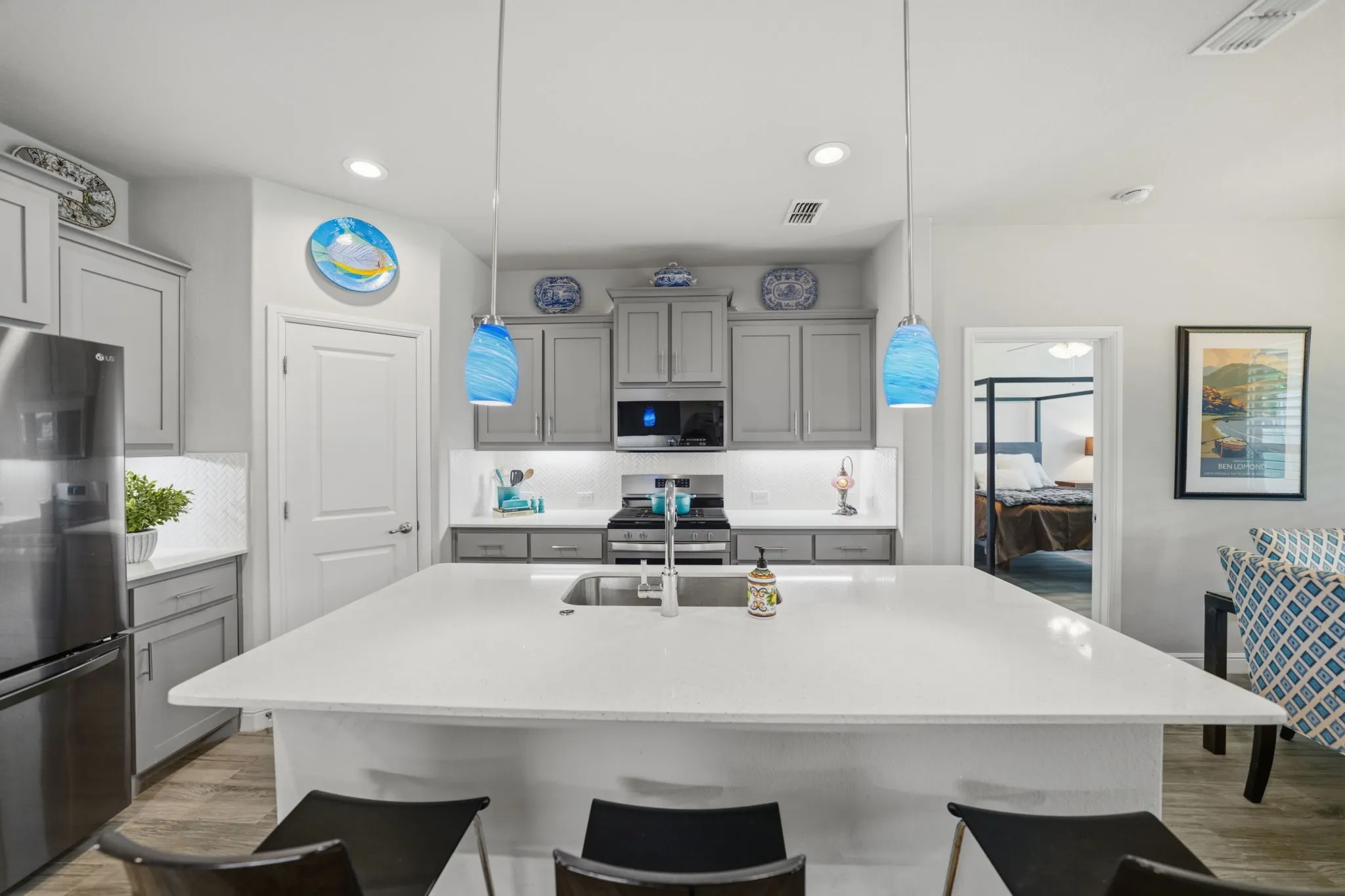 gas range, under counter lighting, and coffee wine bar