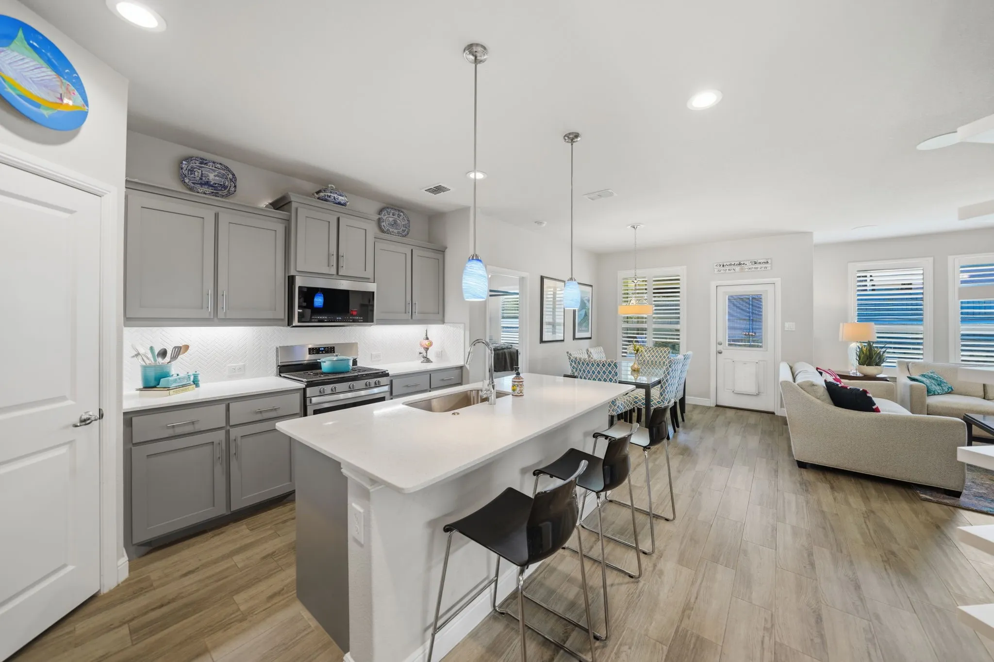 gas range, under counter lighting, and coffee wine bar