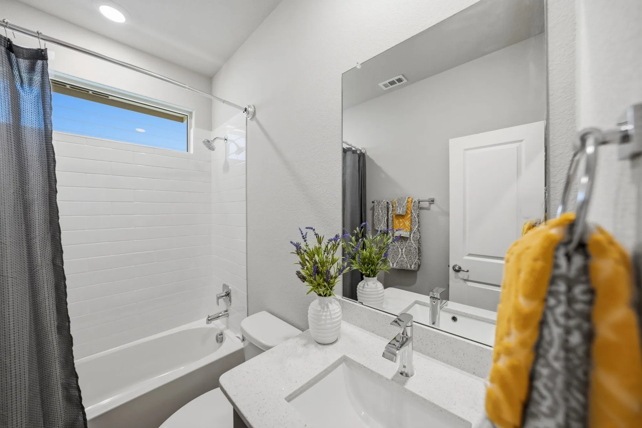 full bath in between the two bedrooms with extra custom privacy doors
