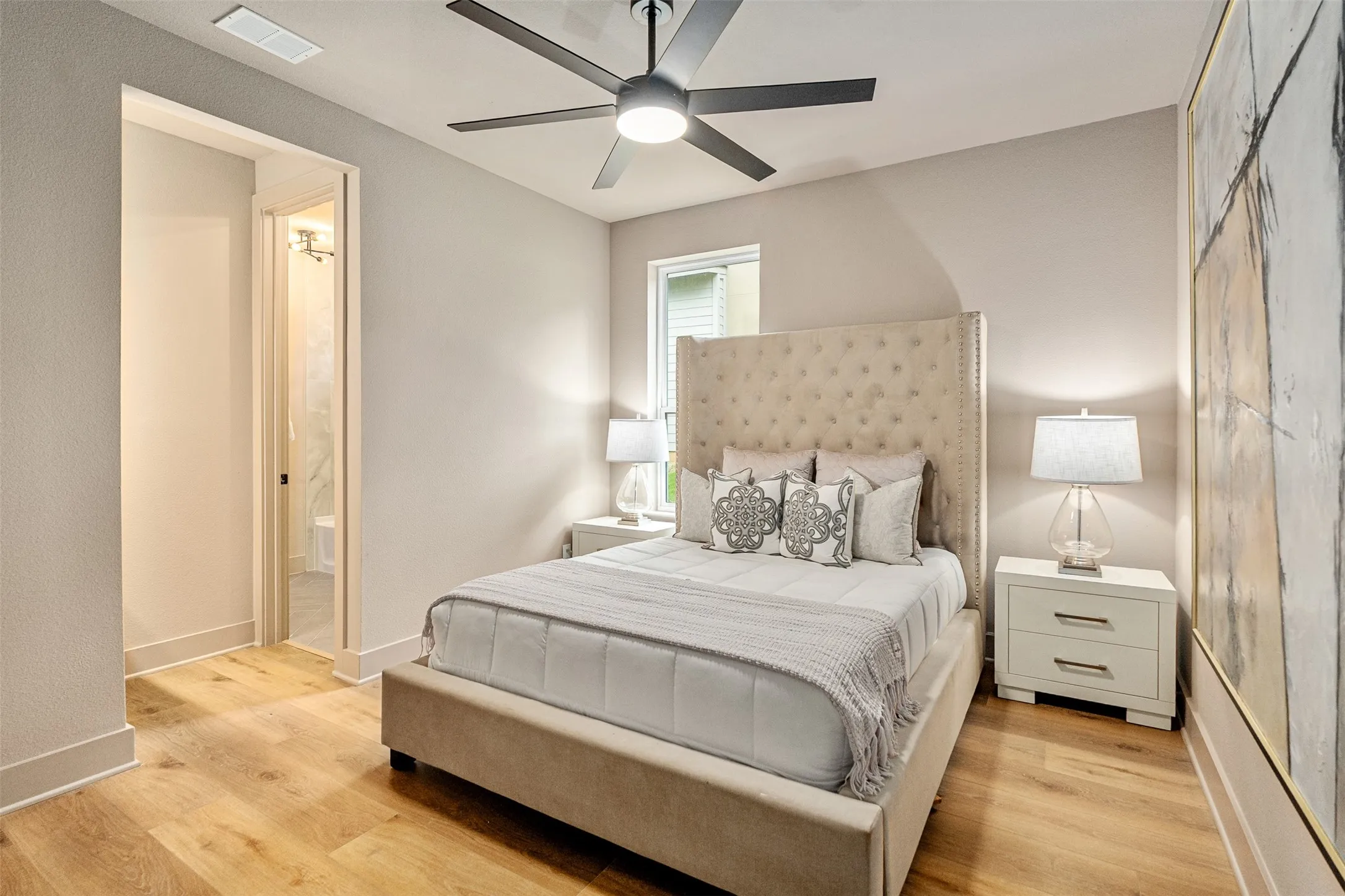 Walk-out level bedroom with private sink & jack & Jill bath