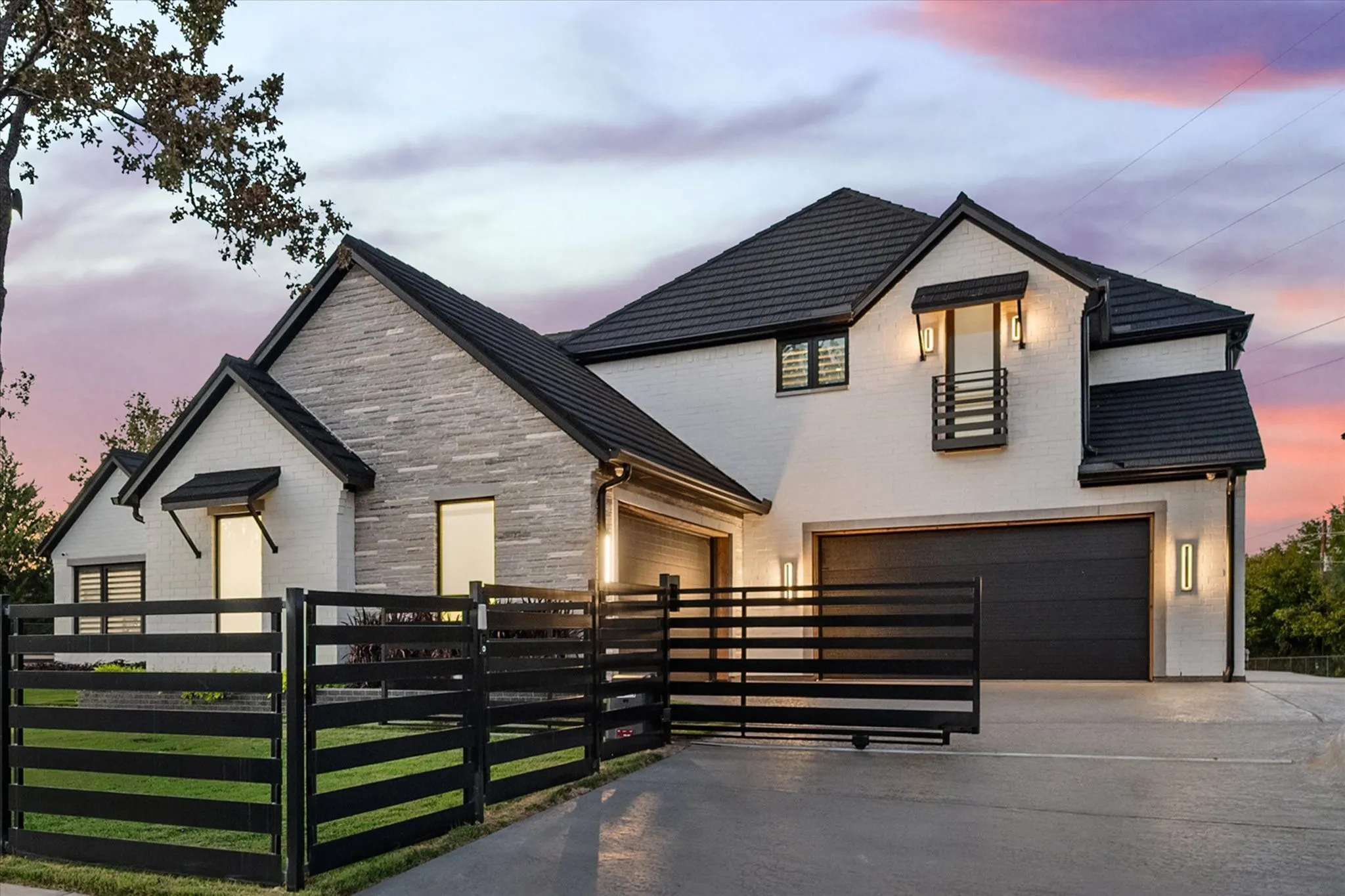 Modern exterior featuring white brick and light gray stacked stone accents