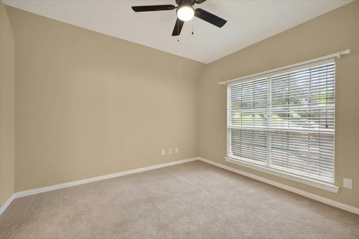 five of six bedrooms providing flexible space for family, guests, or a home office.
