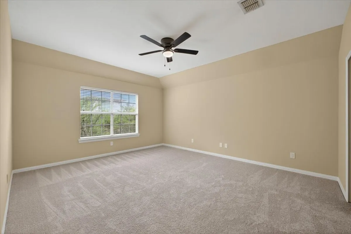 three of six bedrooms providing flexible space for family, guests, or a home office.