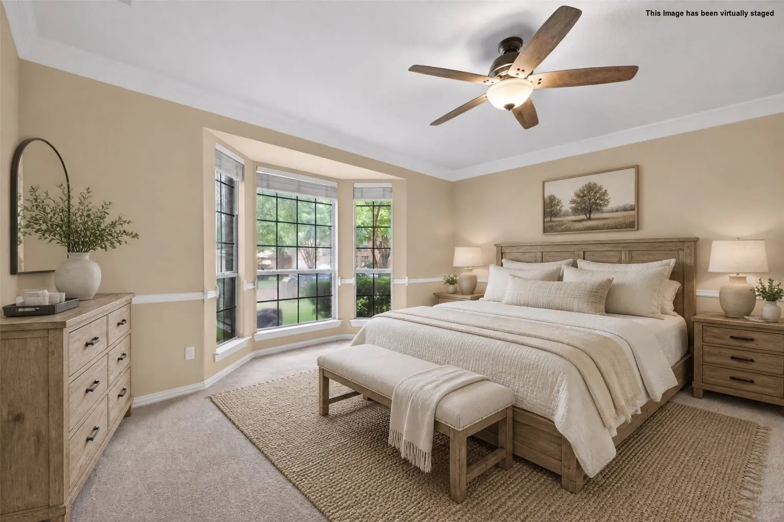 Spacious primary bedroom retreat with comfortable proportions and updated flooring.