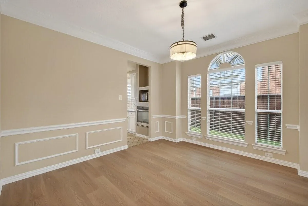 Spacious dining area offering plenty of room for family meals and entertaining guests.