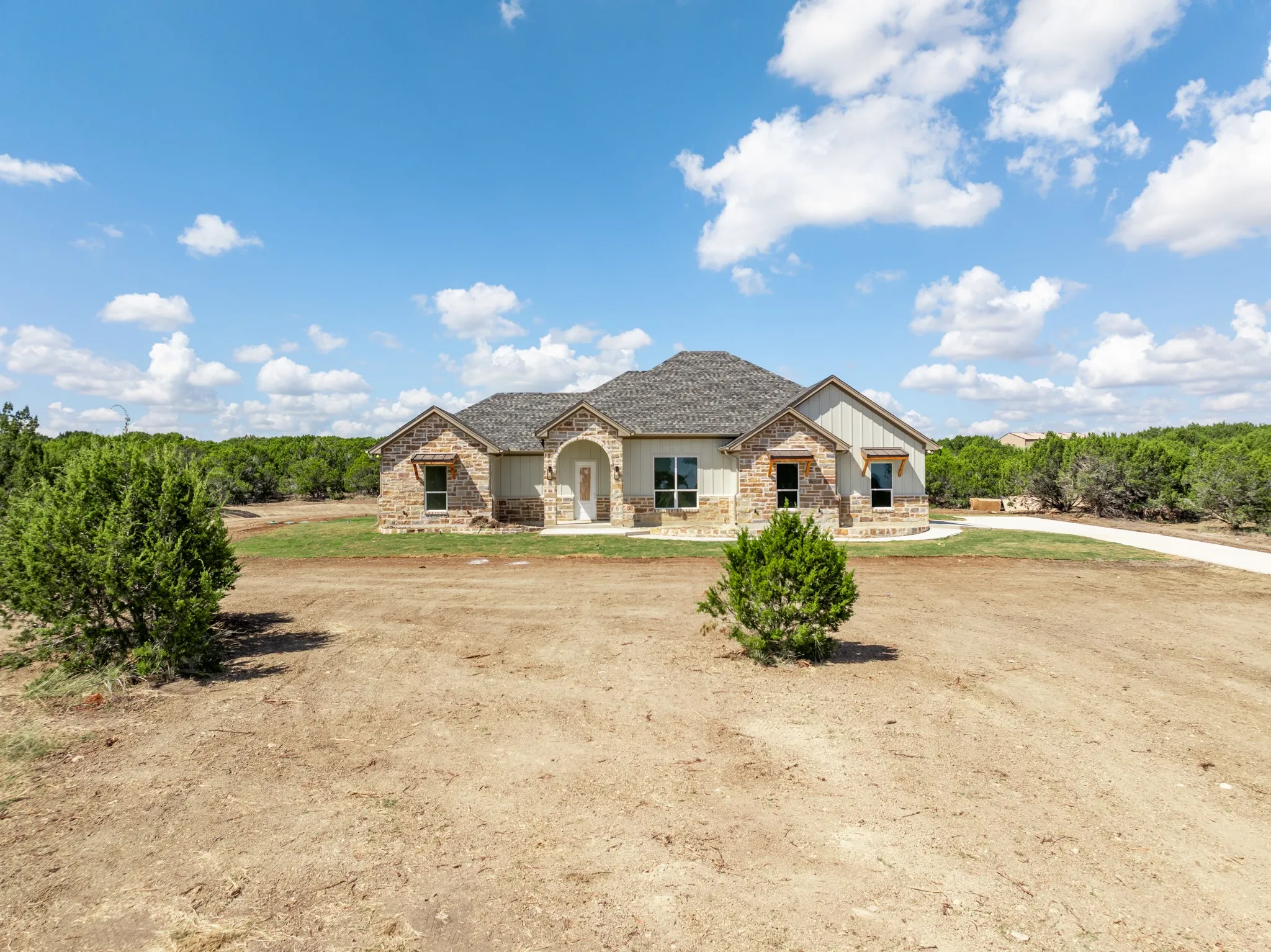 View of front of home with stone siding