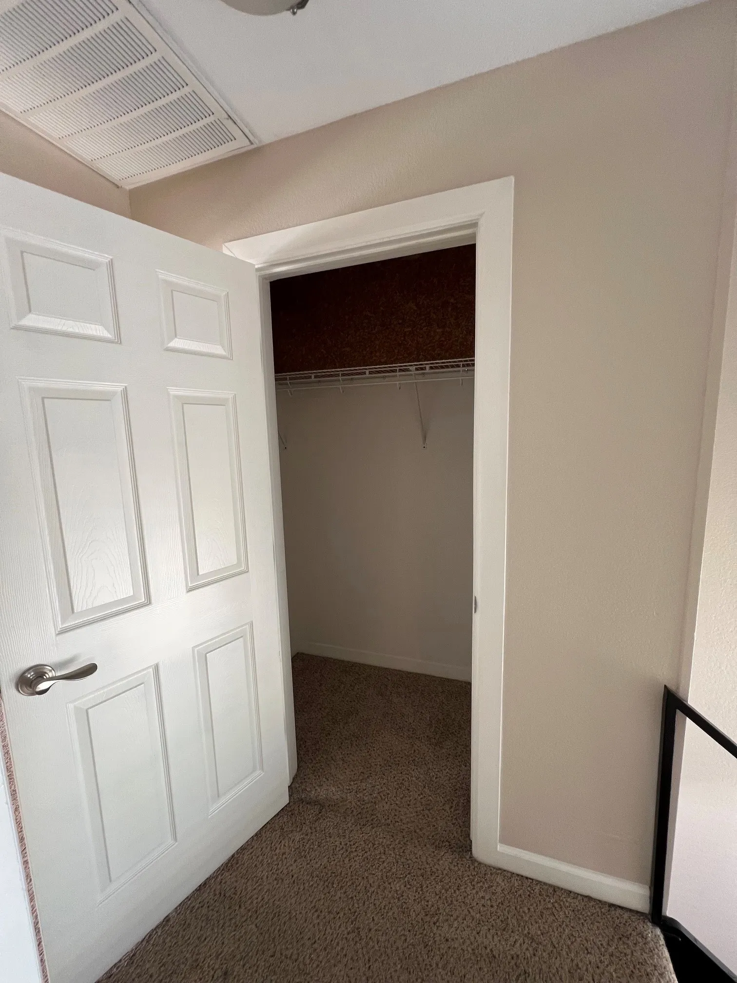 Another Walk-in closet with wire shelving just outside master bedroom!
