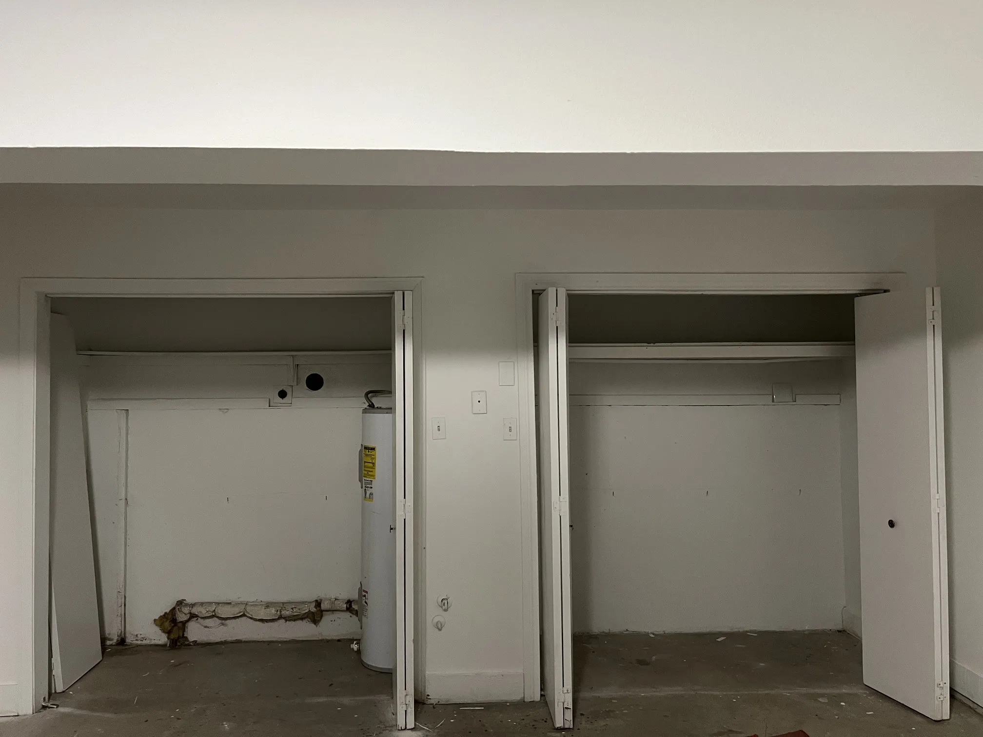 Spacious two-car garage with laundry area closet and additional closet for storage!