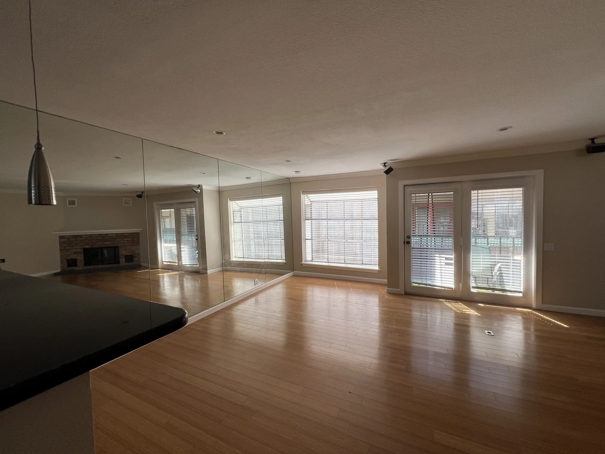 Wood-finish flooring throughout, and lots of windows allowing natural light to flow--even has two plant ledges!