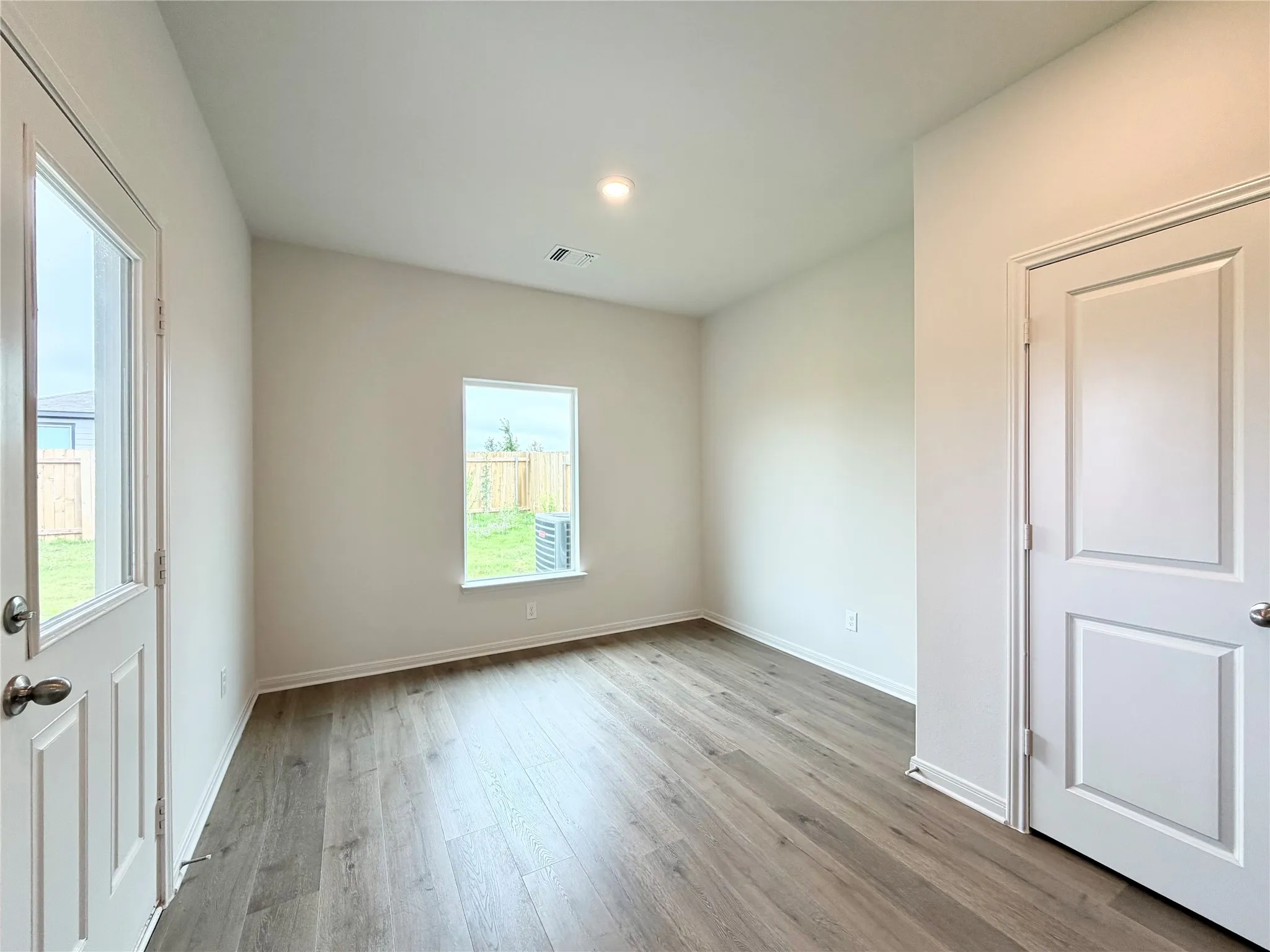 Dining room off the kitchen with access to the back door and back patio