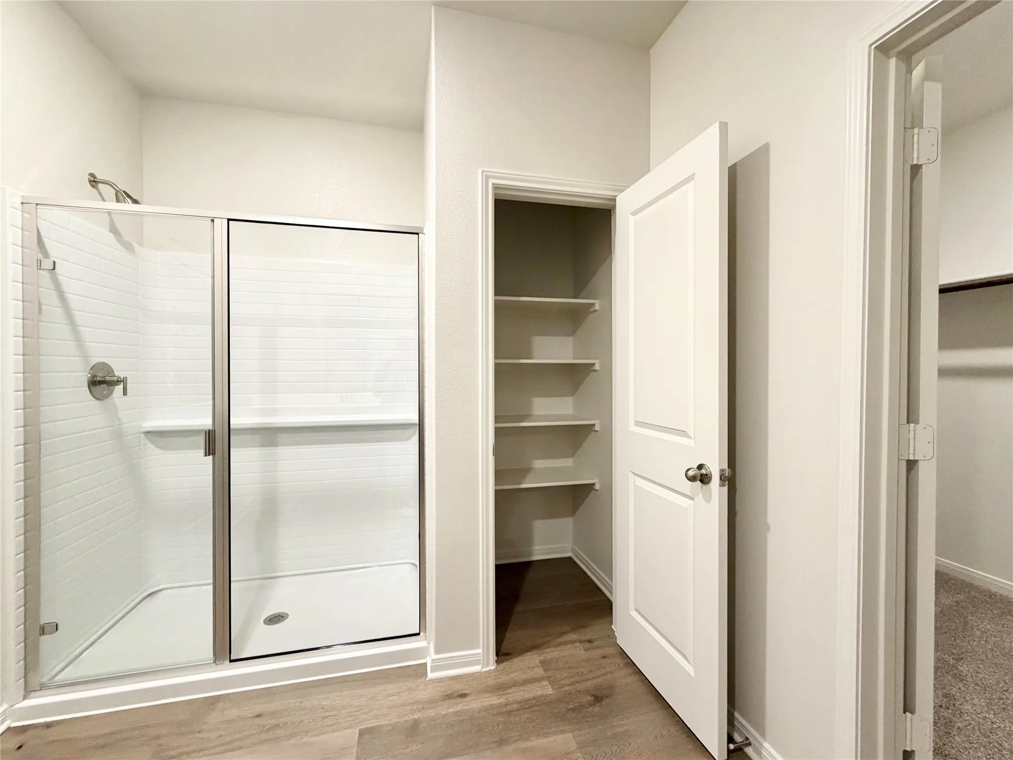 Primary bathroom with linen closet
