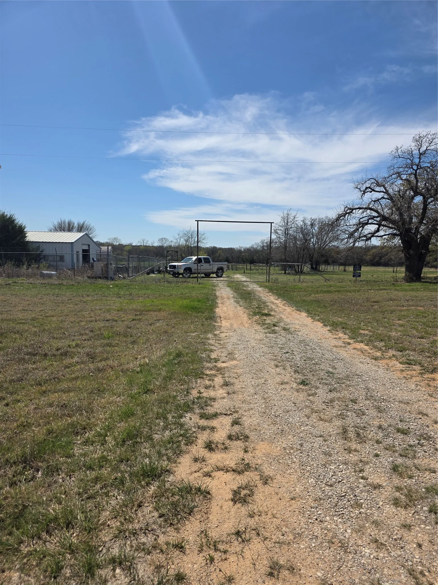 view of gate entry as you approach.  Northside of propertyline is on right side of gate