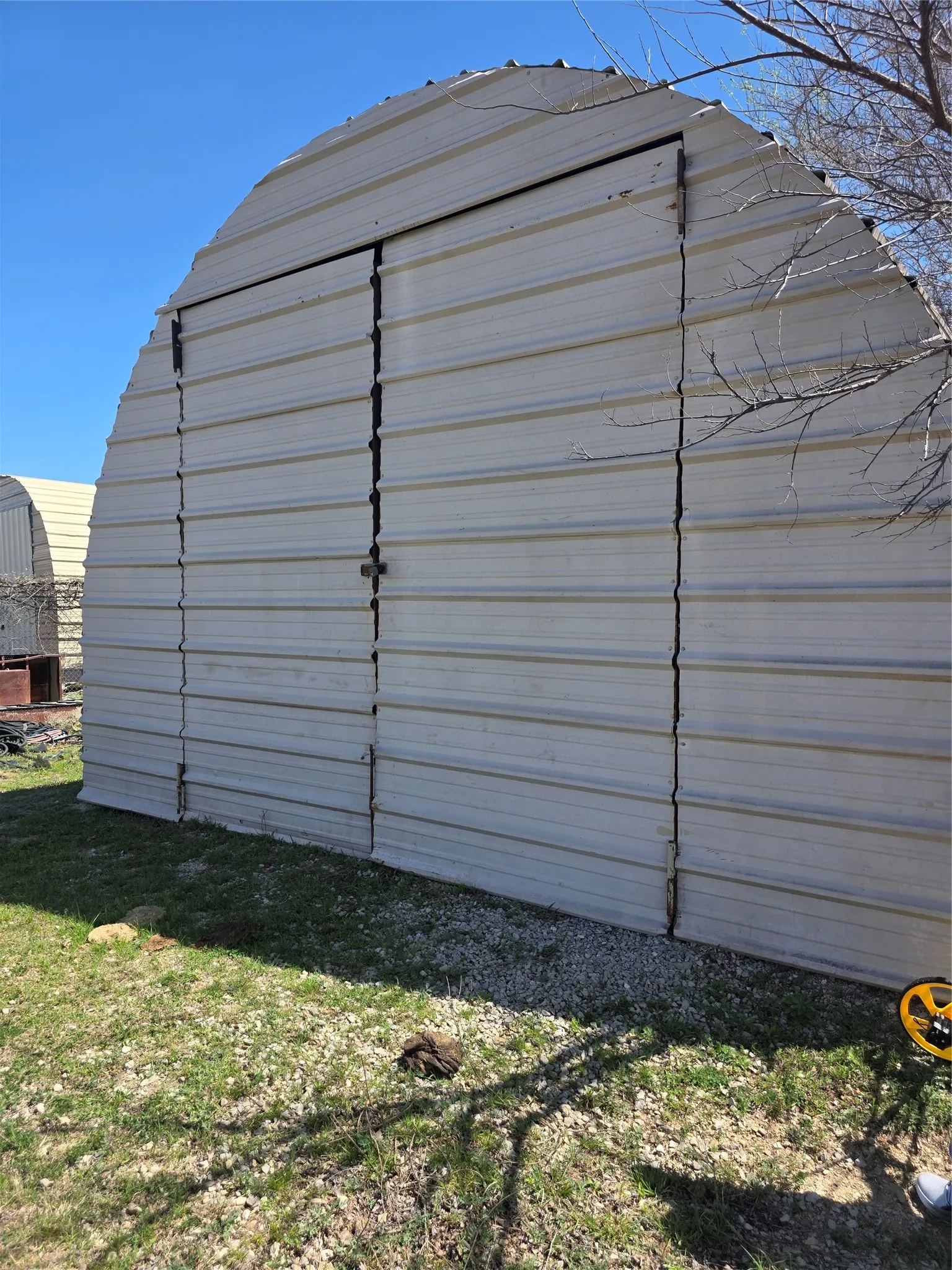 Third building outside fenced area