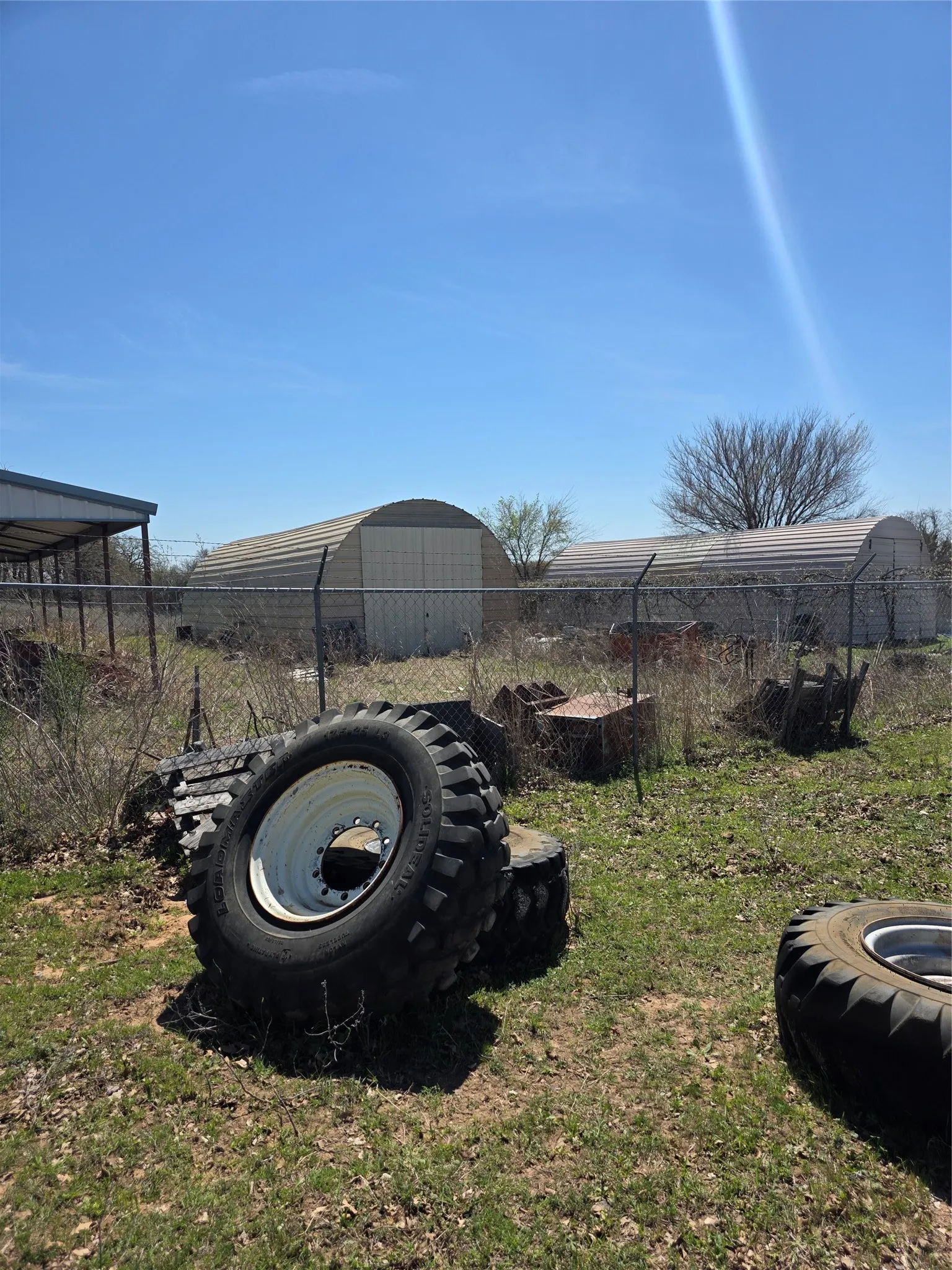 View of all three building.  All other items pictured to be removed by Seller