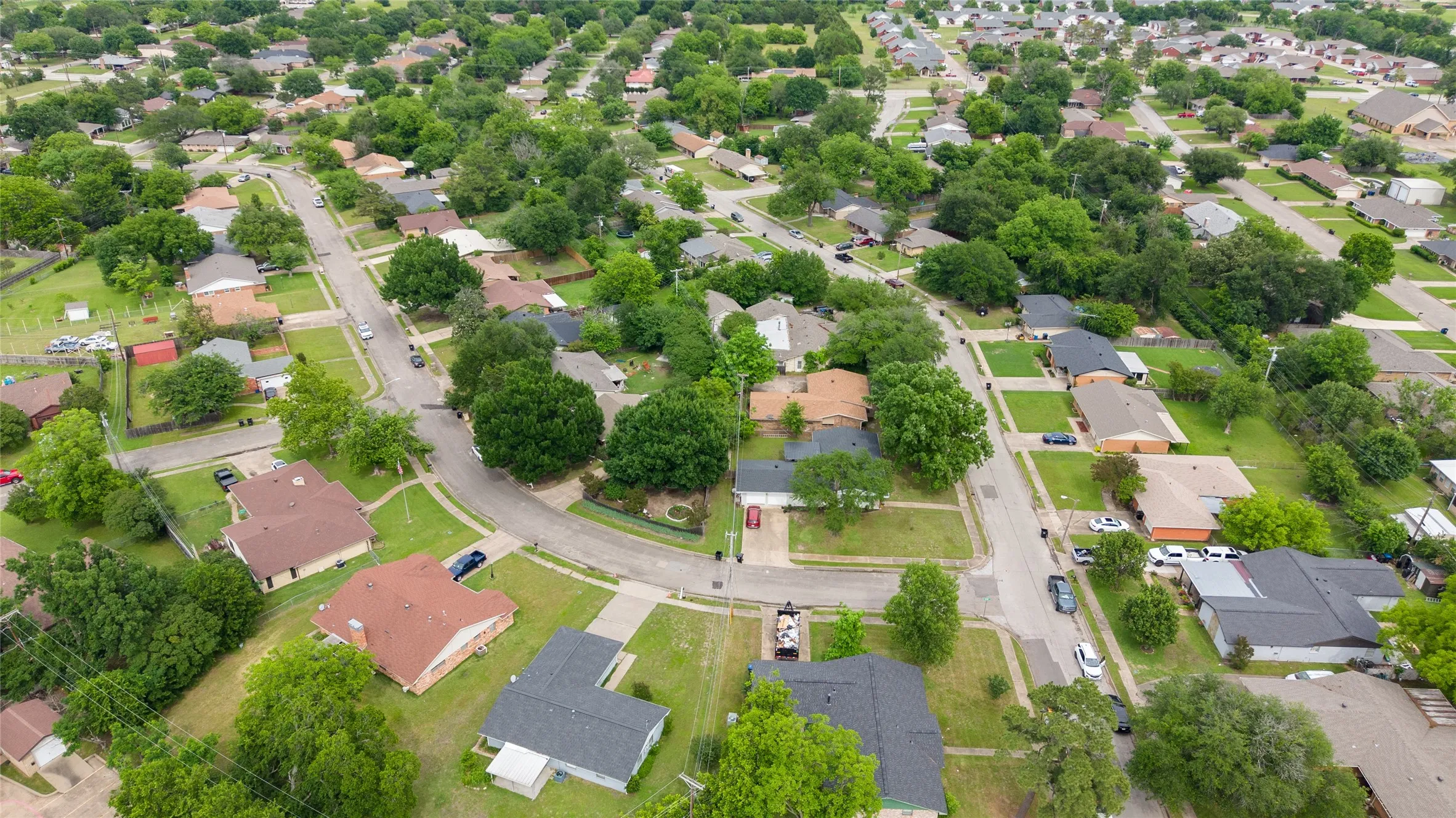 Residential neighborhood with established streets and mature trees