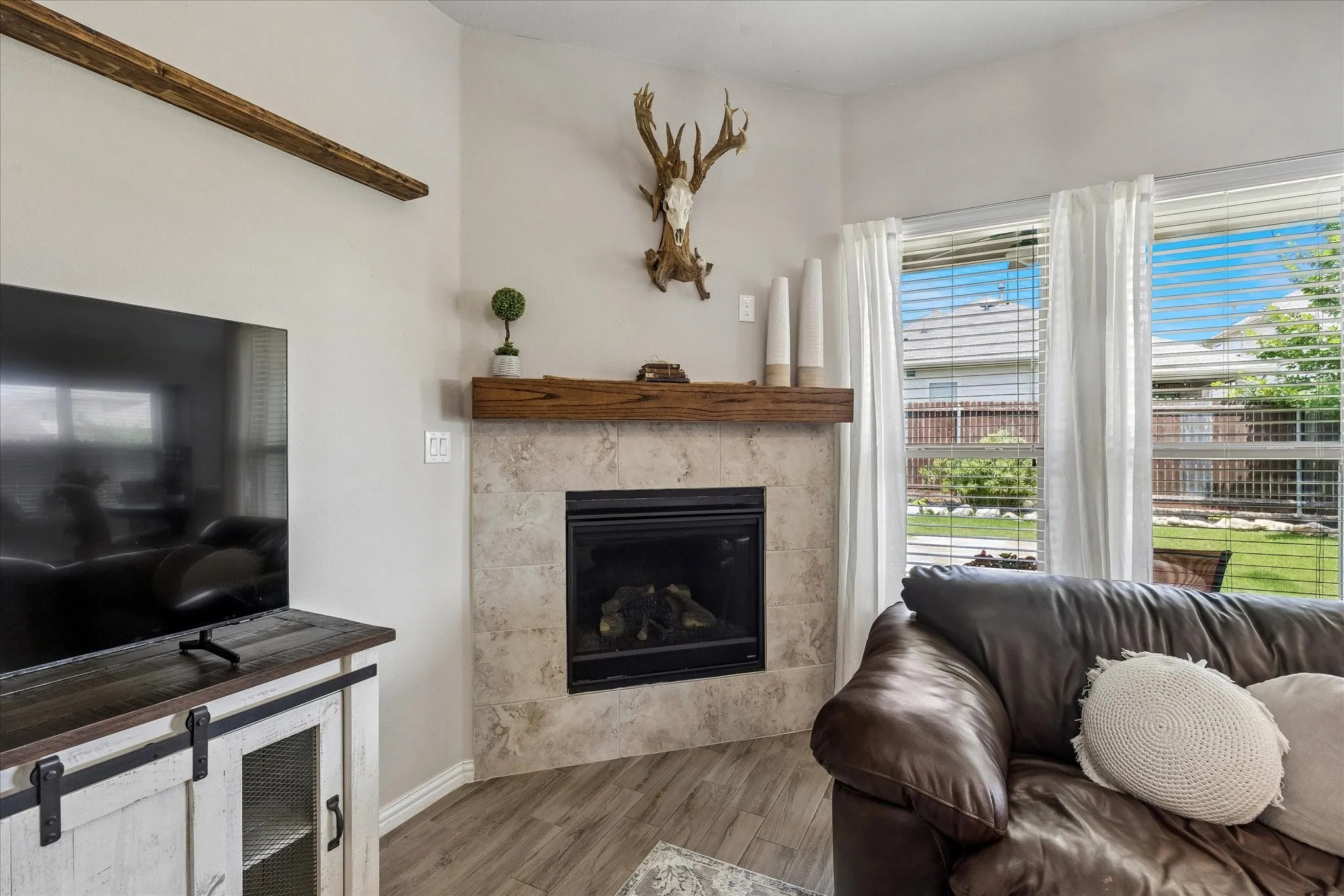 Open Living area with a cozy gas fireplace. A great place to bundle up on a cold winter night.