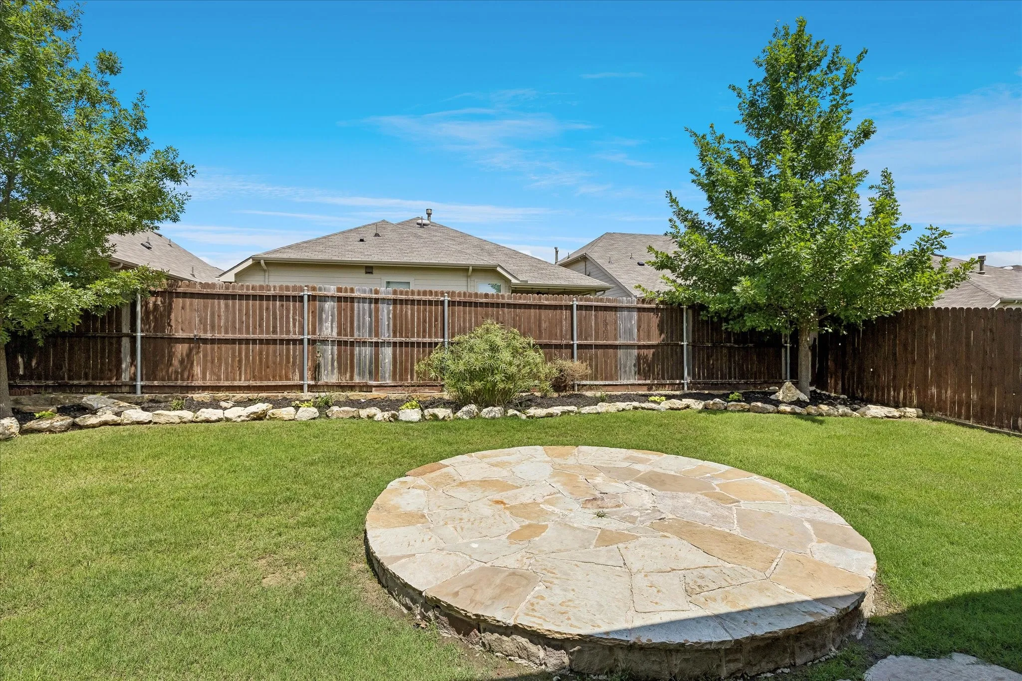 Perfect spot for patio furniture or a firepit.