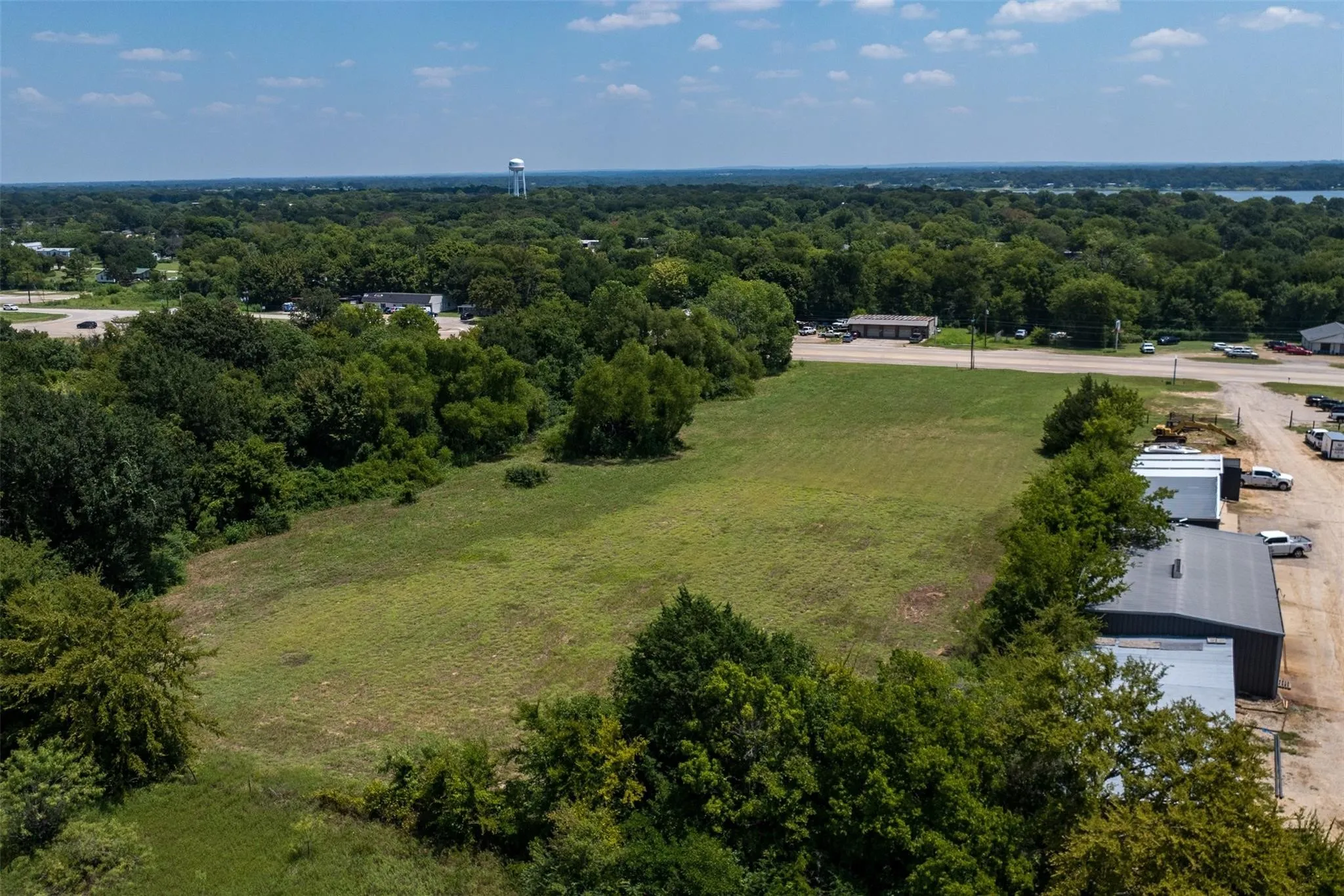 Expansive undeveloped lot with existing road frontage