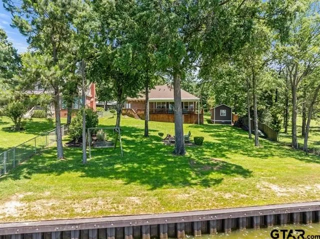 Single Family Residence For Sale in Henderson County , 3522 S Island Drive, Chandler, Texas 75758, 3 Bedrooms, 2 Bathrooms, 2 Garage spaces, 1,949 Sqft, built in 1996, Price $799,000, mls#21266480, Real Estate Agent in Chandler, Homes For Sale in Henderson county, Homes For Sale in Chandler, Realtor in Chandler Texas, Real Estate Brokerage Independent Realty Texas, Luminita Cordes Realtor