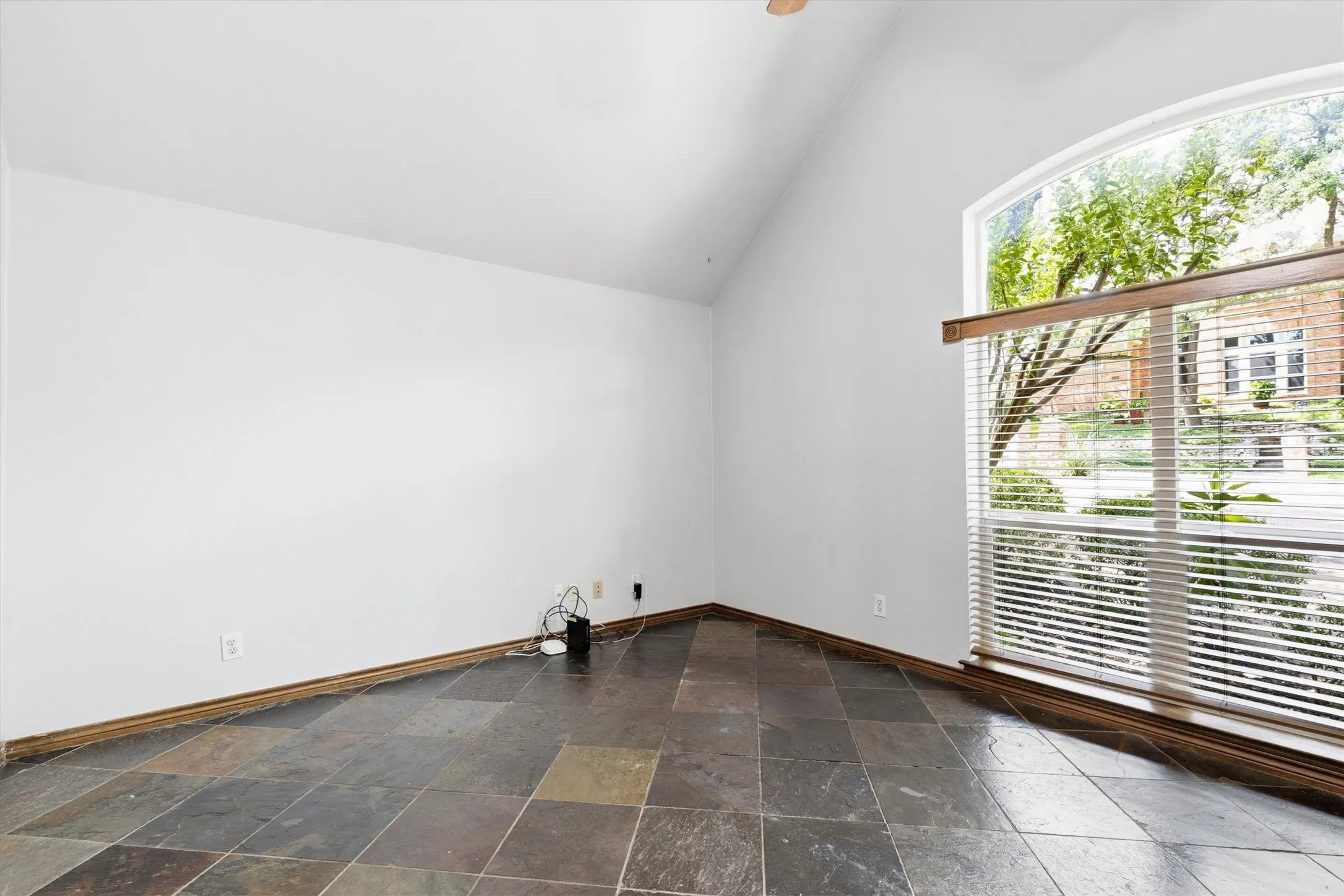 Flex bedroom with built-ins—ideal as office, guest room, or hobby space.