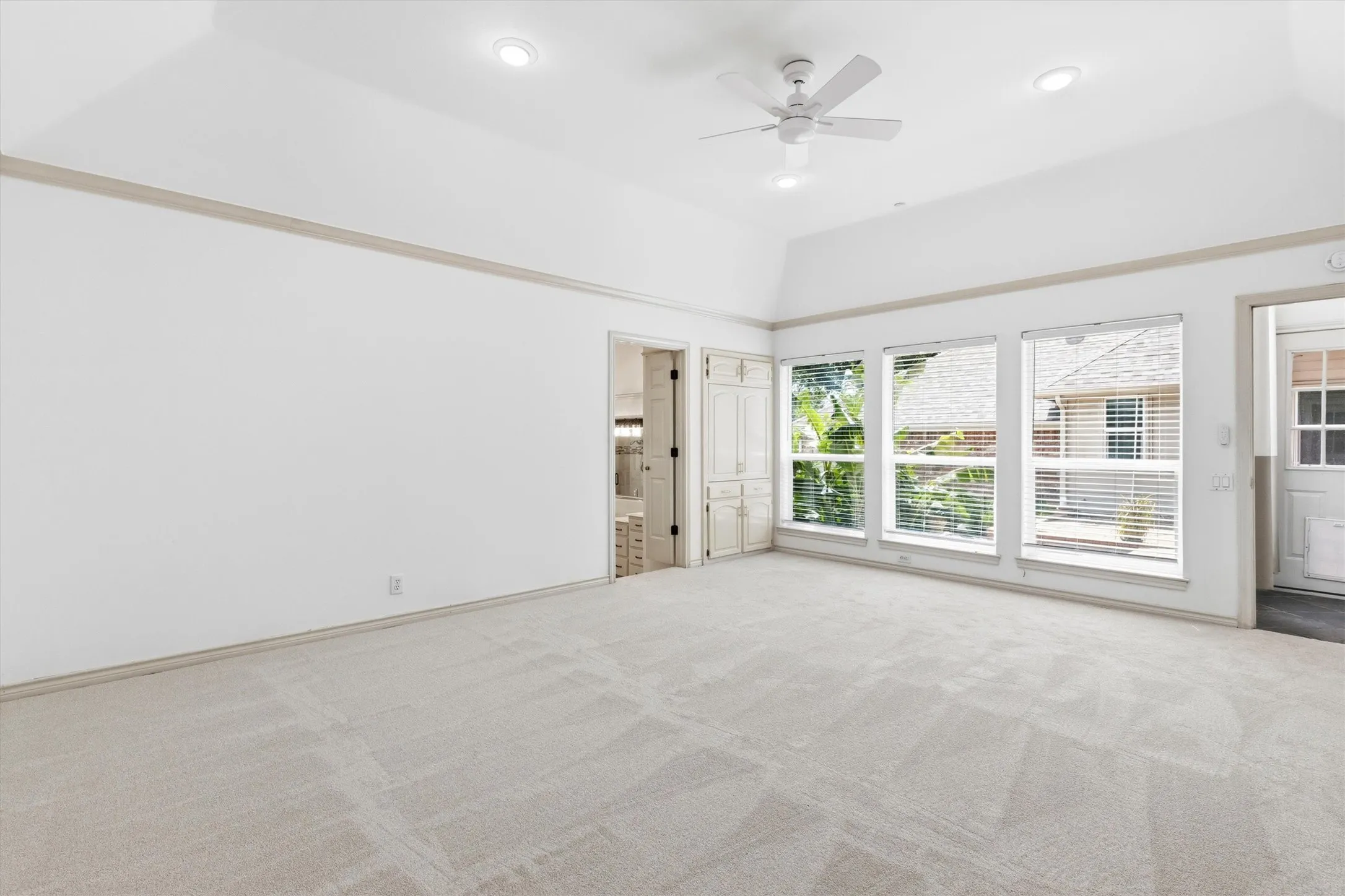 Private primary suite wing with generous space and natural light.